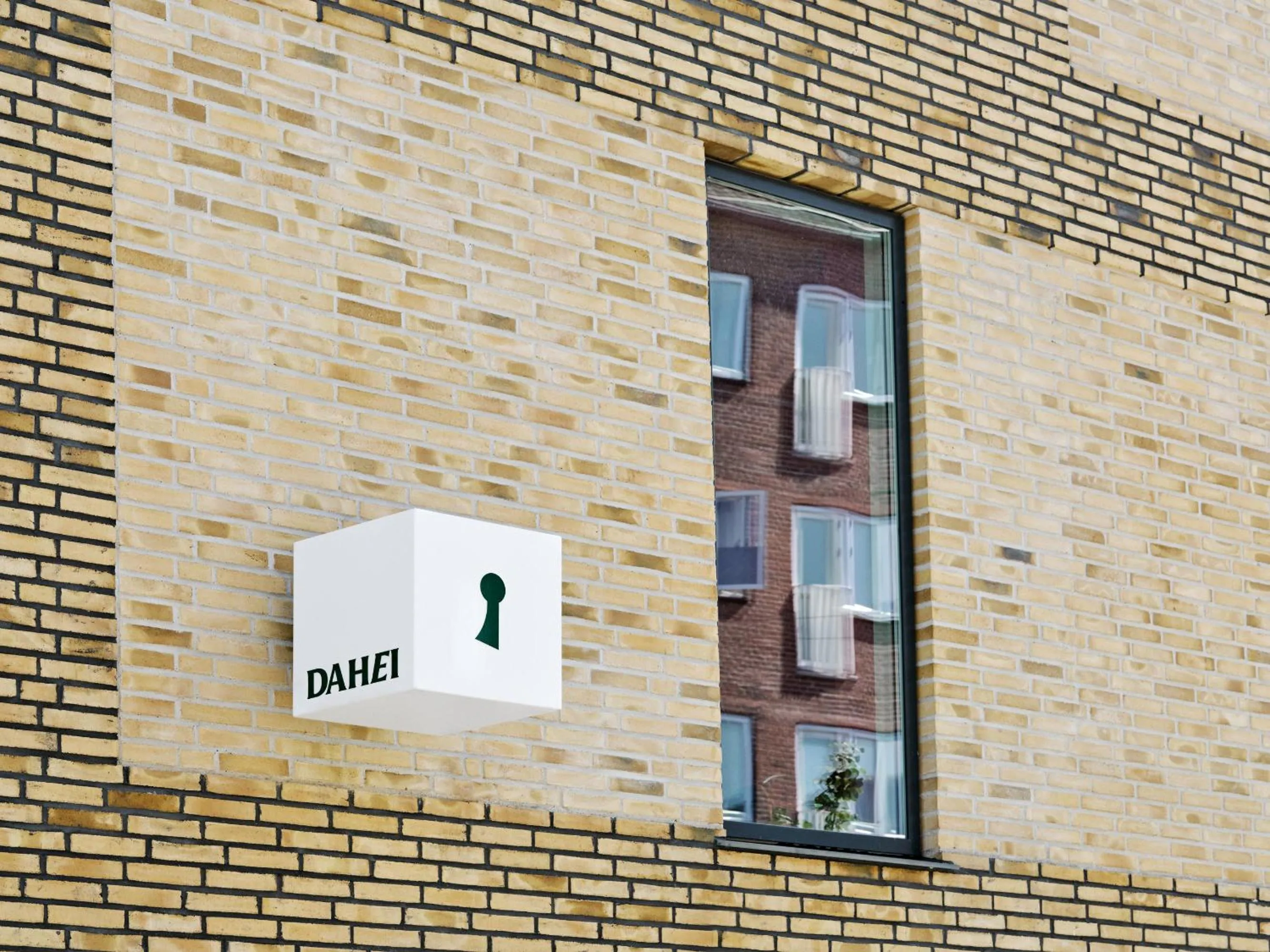 Property logo or sign in Dahei Apartment Hotel