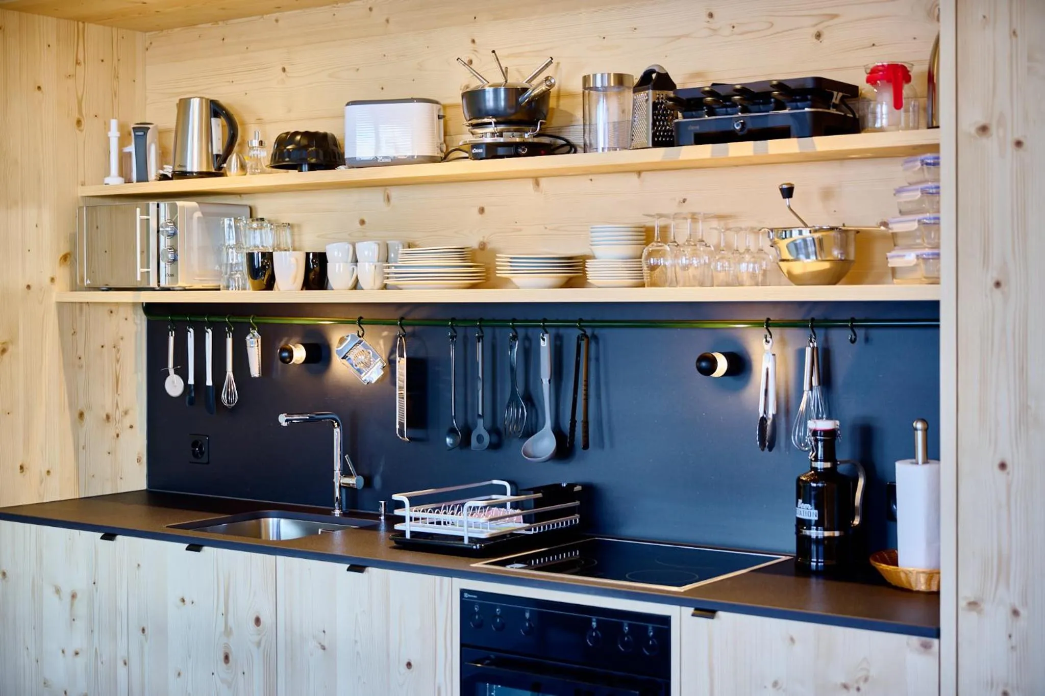 Kitchen or kitchenette in Apart Hotel Adelboden am Dorfplatz