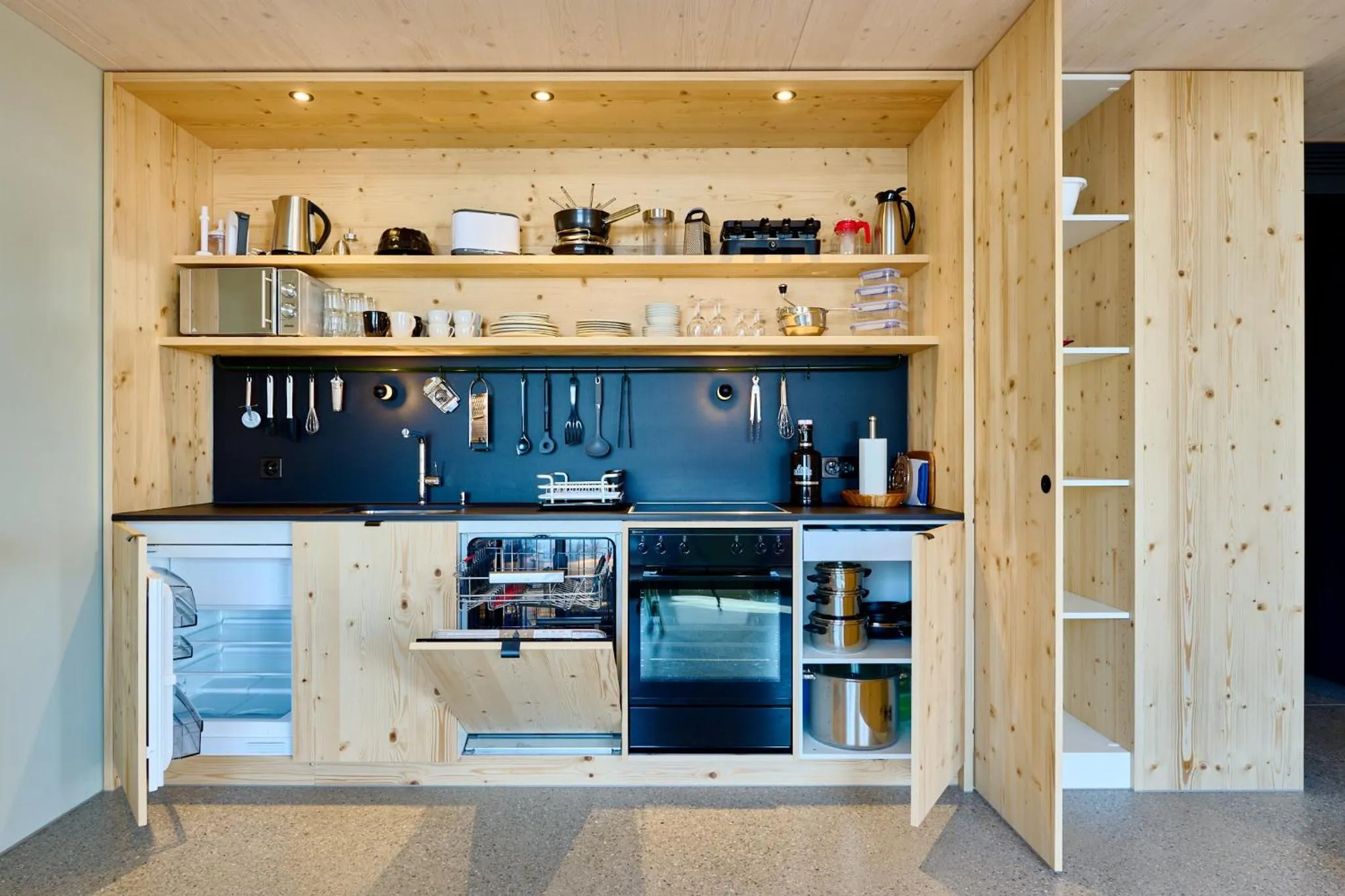 Kitchen or kitchenette in Apart Hotel Adelboden am Dorfplatz