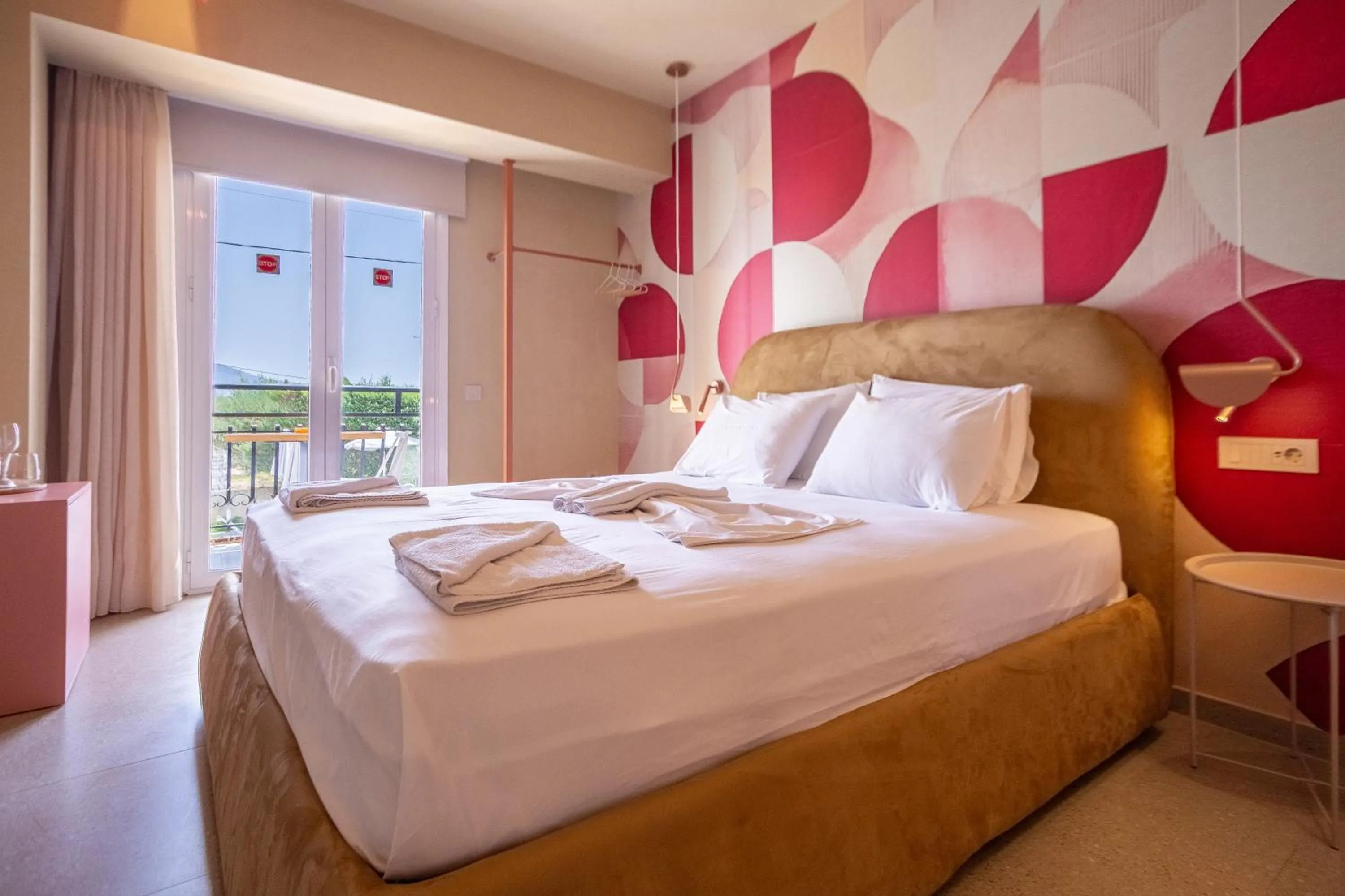 Bed in Rose Club Apartments