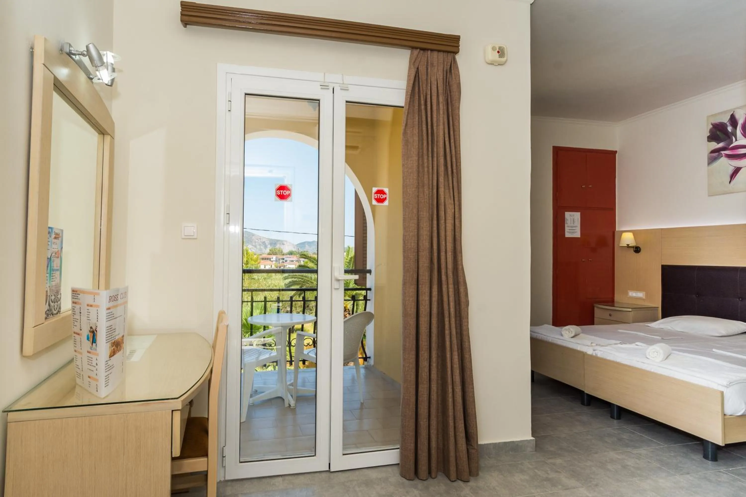 Patio, Bed in Rose Club Apartments