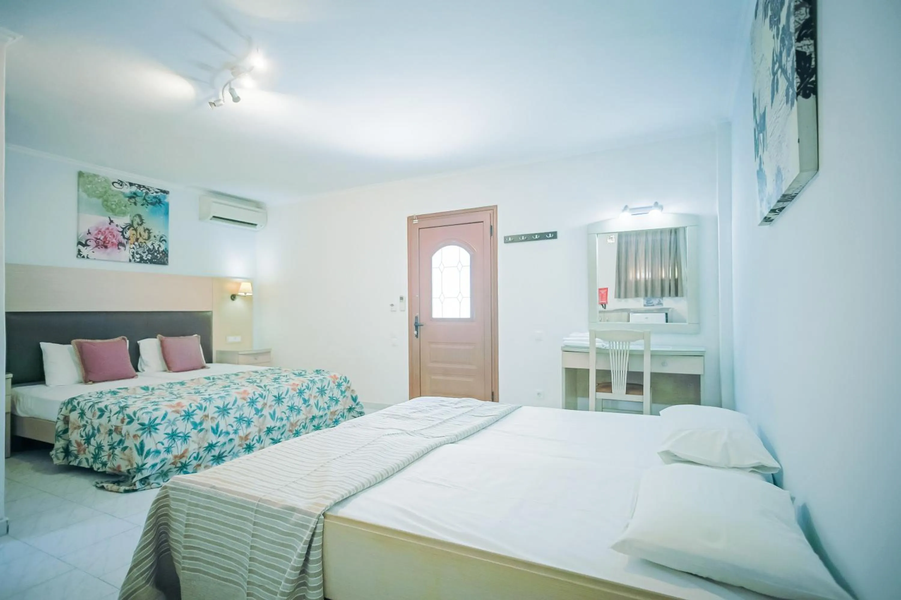 Bed in Rose Club Apartments