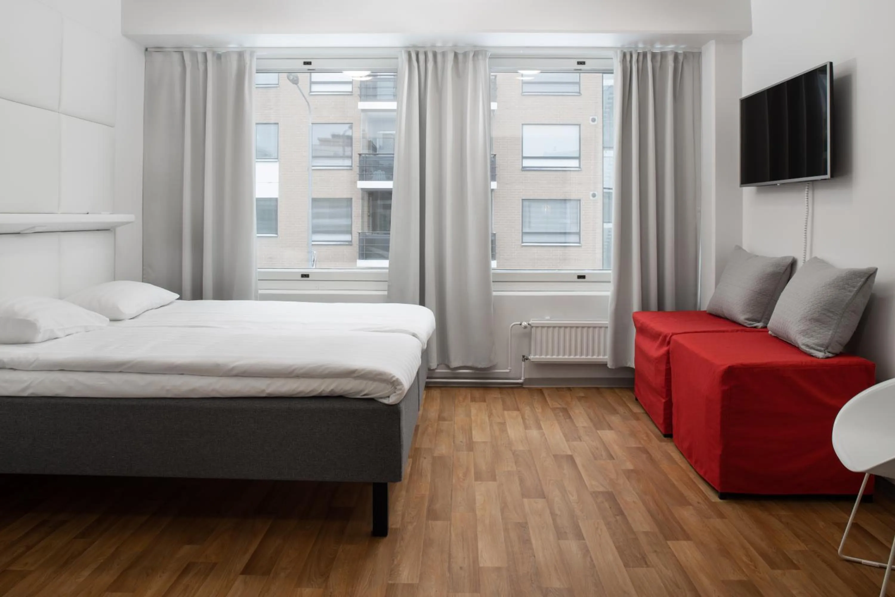 Photo of the whole room, Bed in Omena Hotel Pori