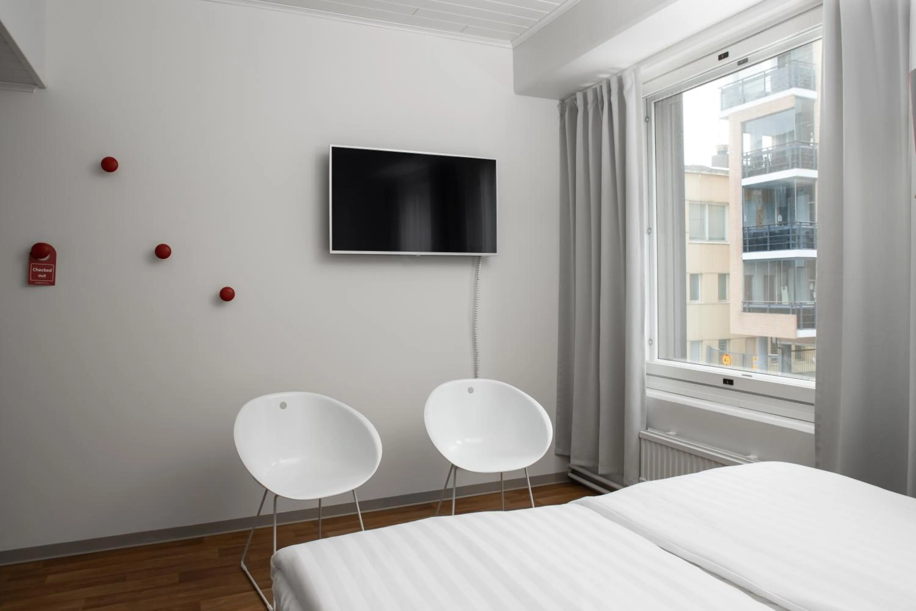 TV and multimedia, Bed in Omena Hotel Pori