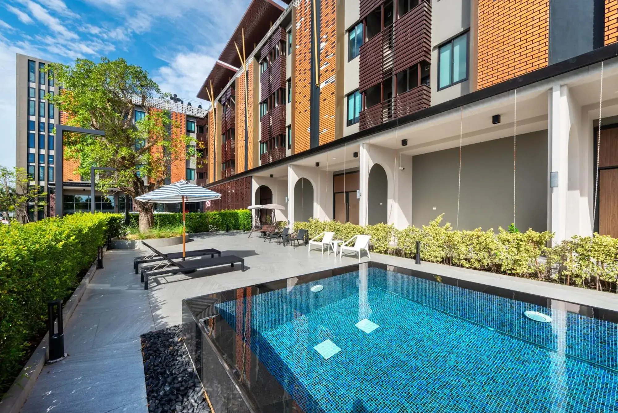 Swimming pool in PLAAI Plus Hotel Rayong Swimming pool in PLAAI Plus Hotel Rayong