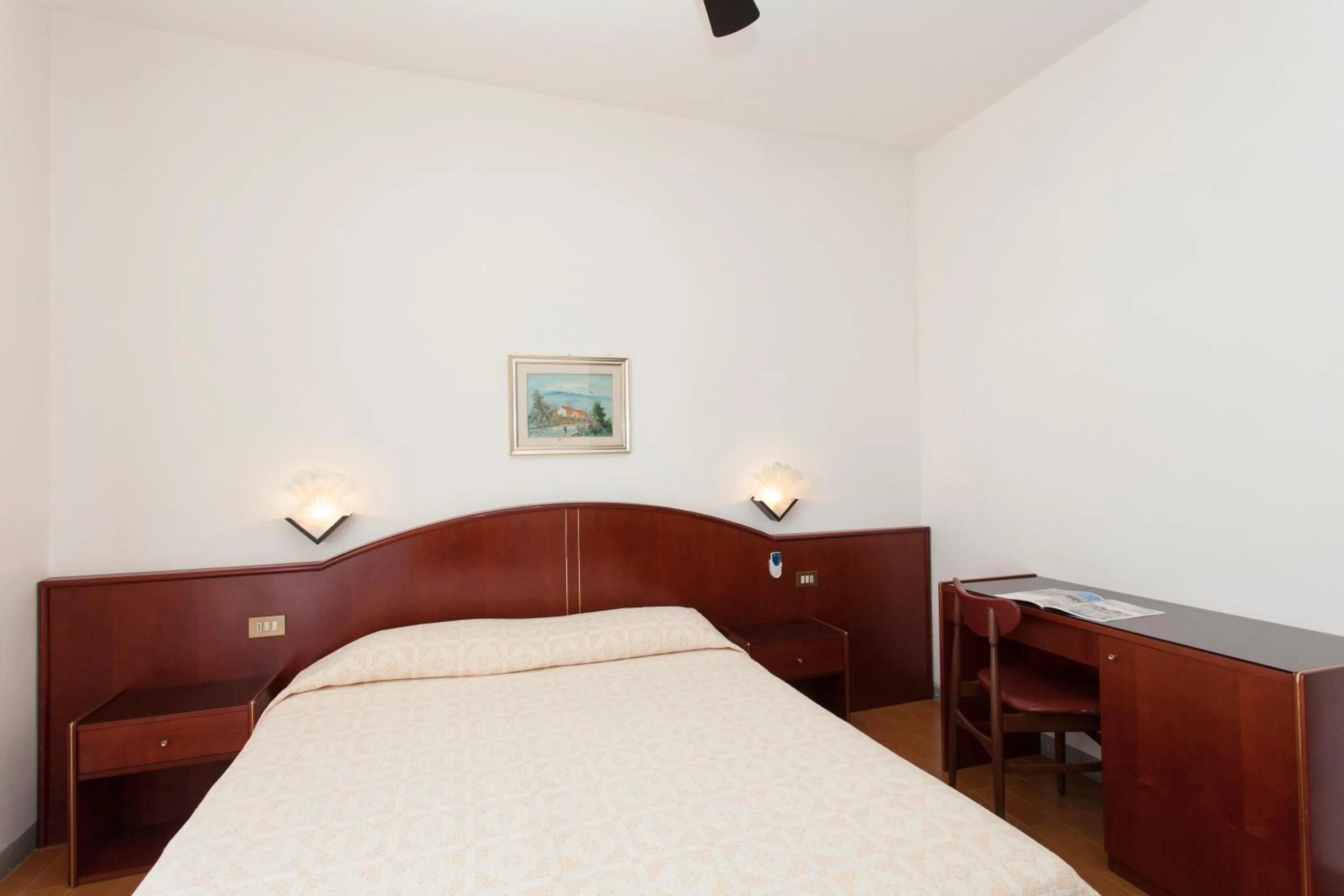 Bed in Hotel Arborea