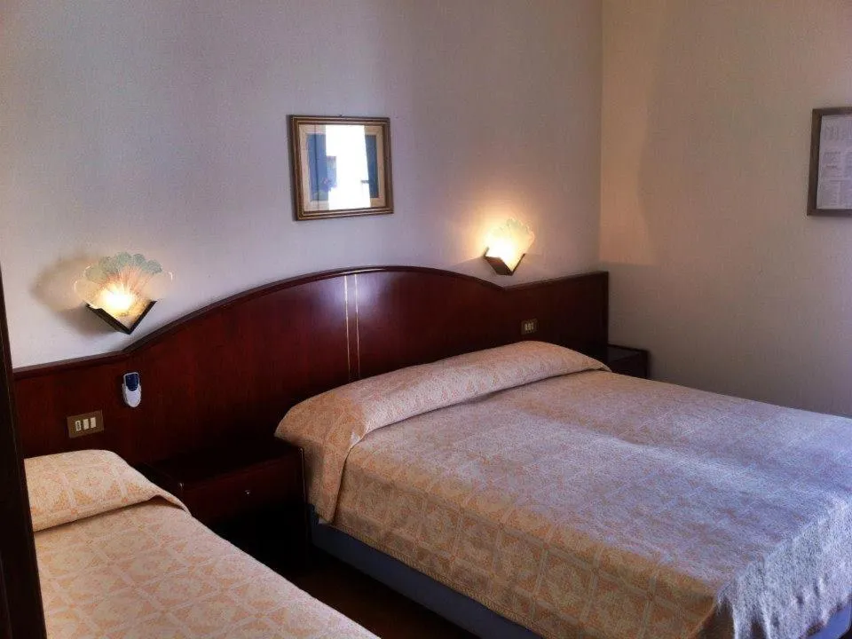 Bed in Hotel Arborea