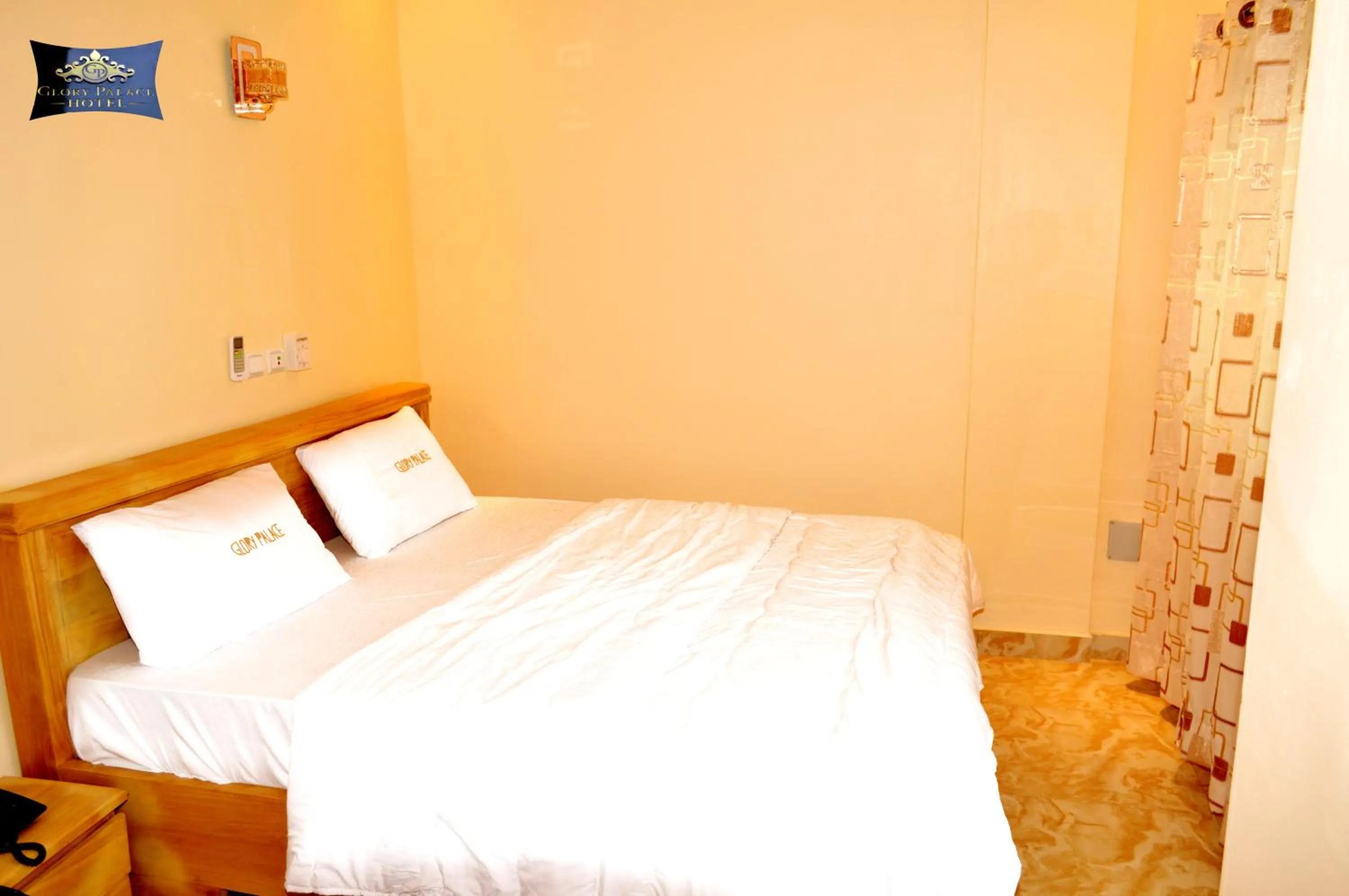 Bed in Glory Palace Hotel