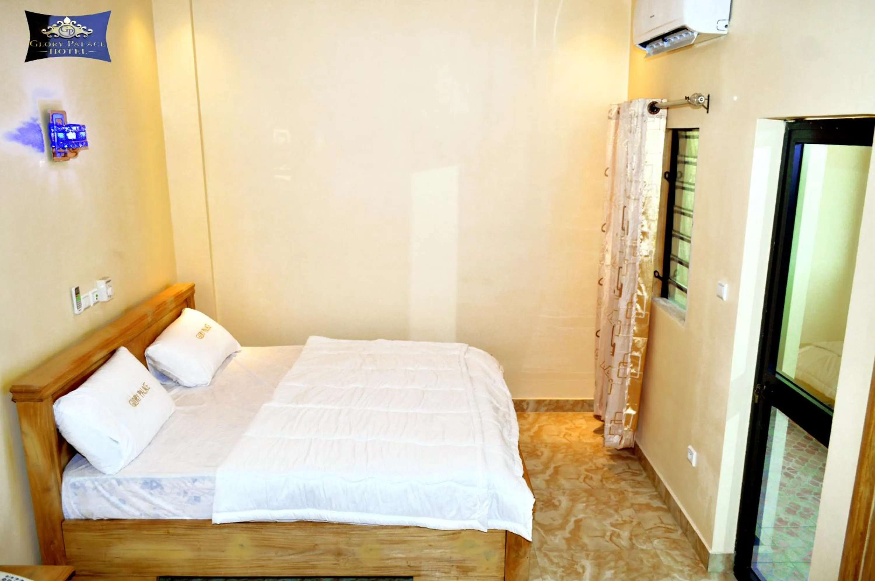 Bed in Glory Palace Hotel