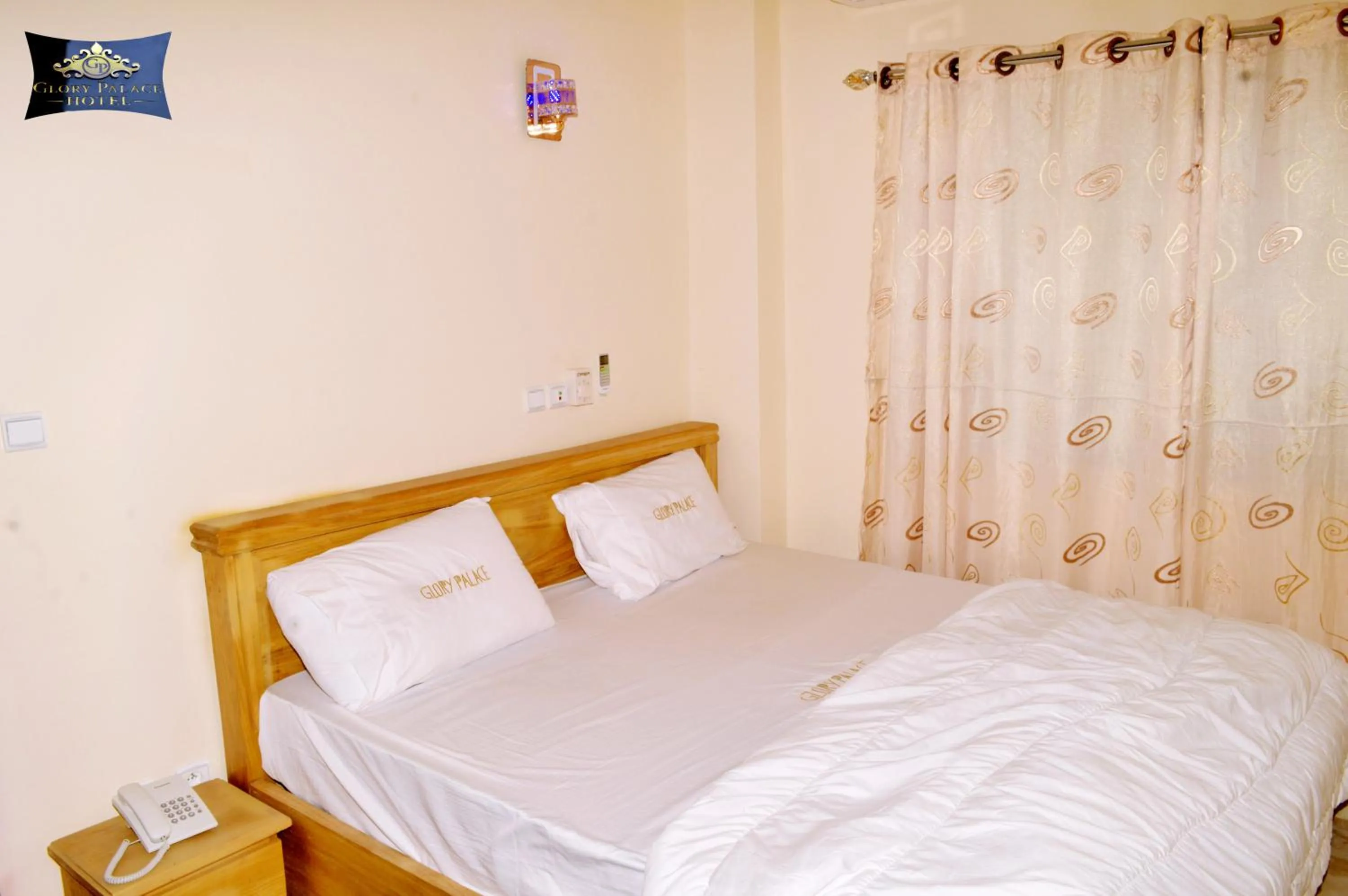 Bed in Glory Palace Hotel