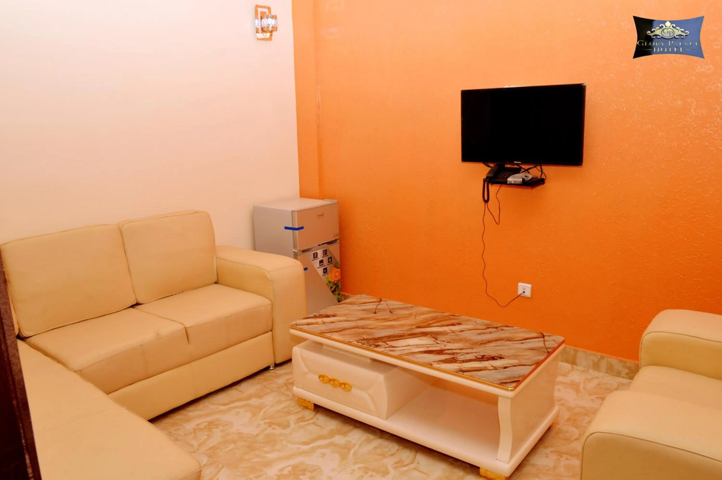 Communal lounge/ TV room in Glory Palace Hotel