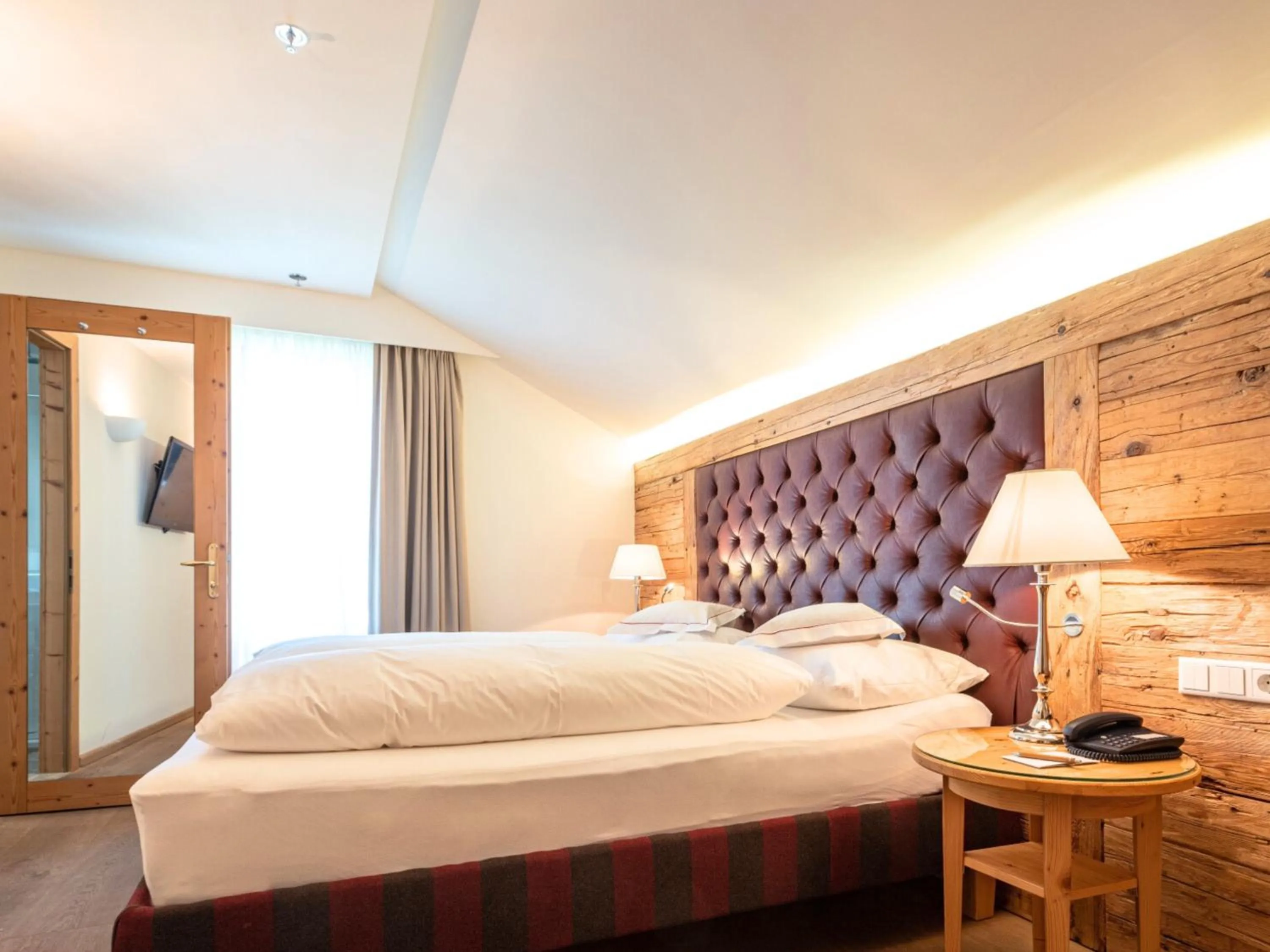 Bed in Hotel Kaiserhof Kitzbühel, 4 Sterne Superior