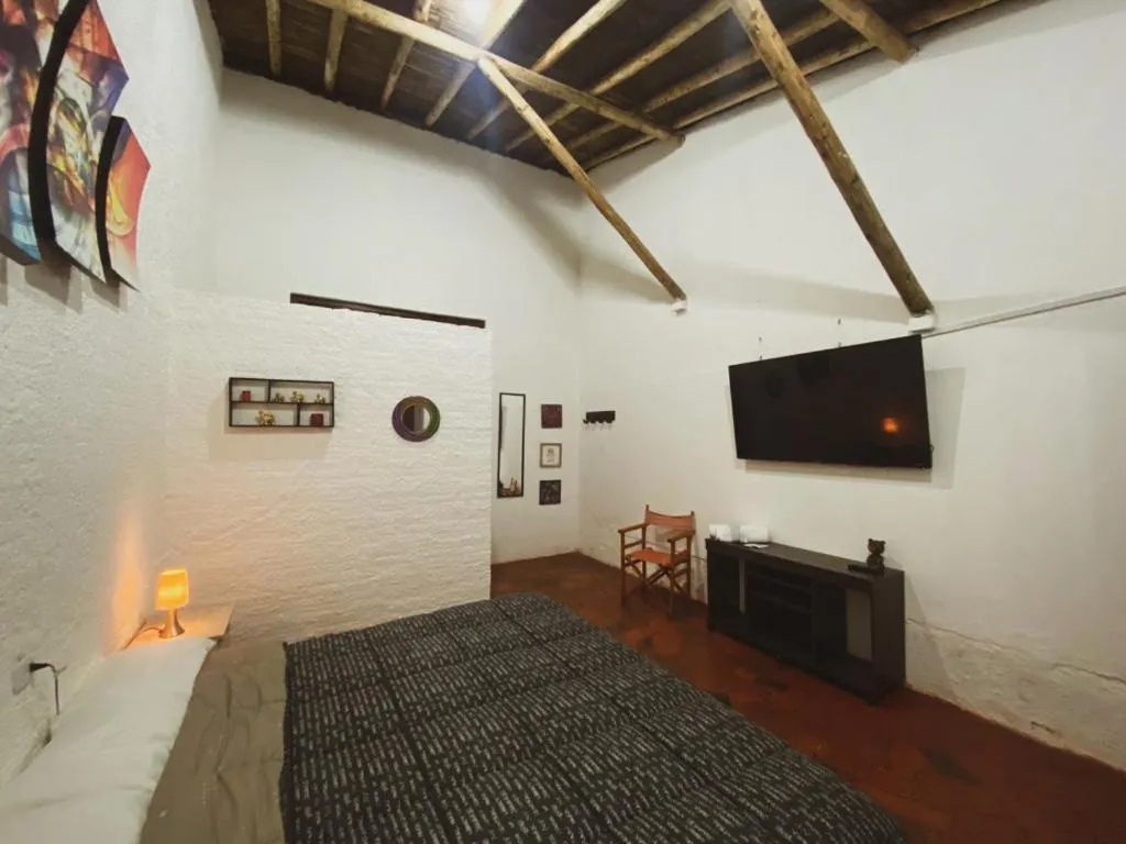 Photo of the whole room, Bed in Club AVIVA Guatavita - Hostel - Restaurante, Disco & Bar