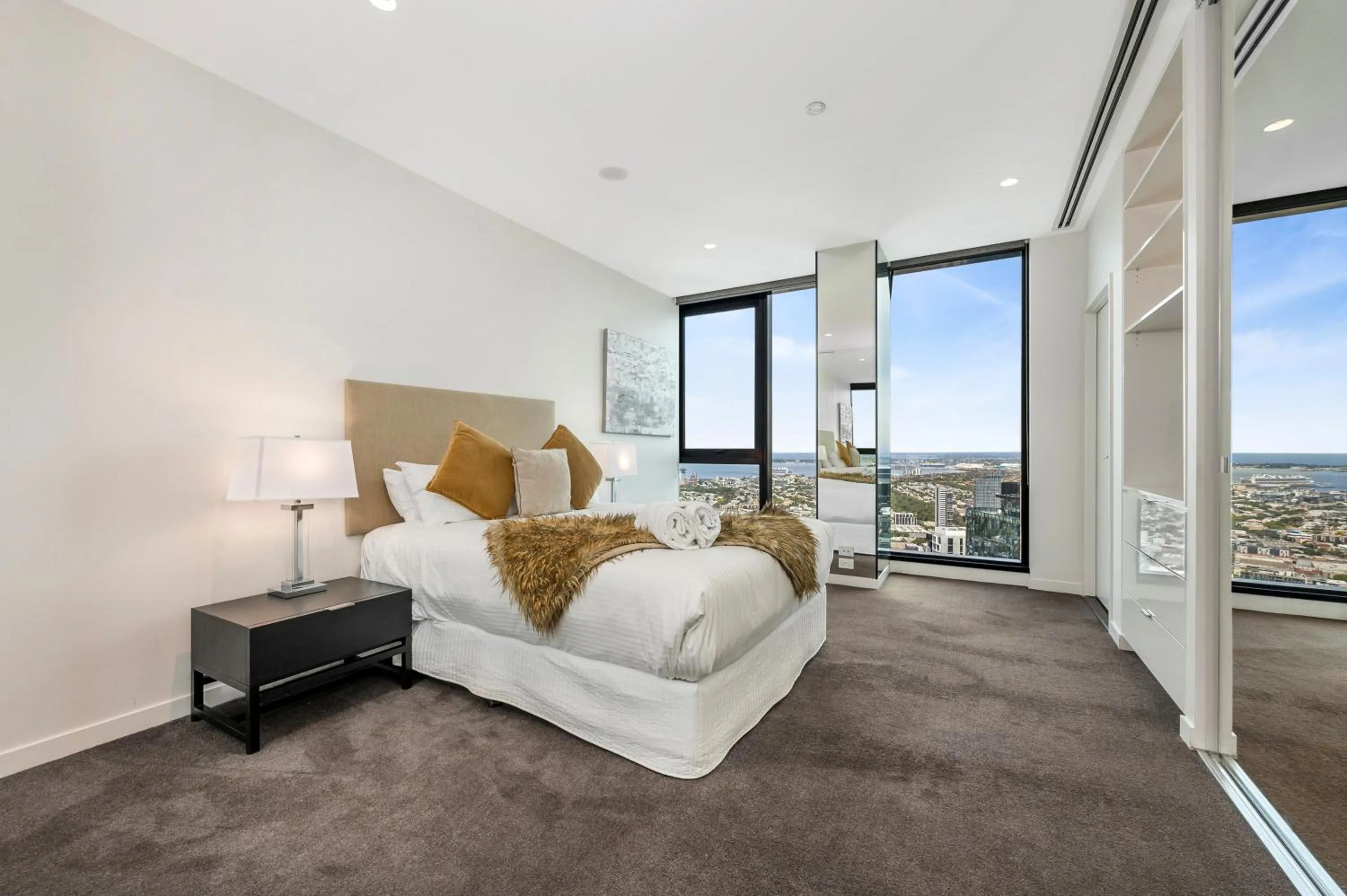 Bedroom, Bed in Melbourne City Apartments Panoramic Skyview Penthouse