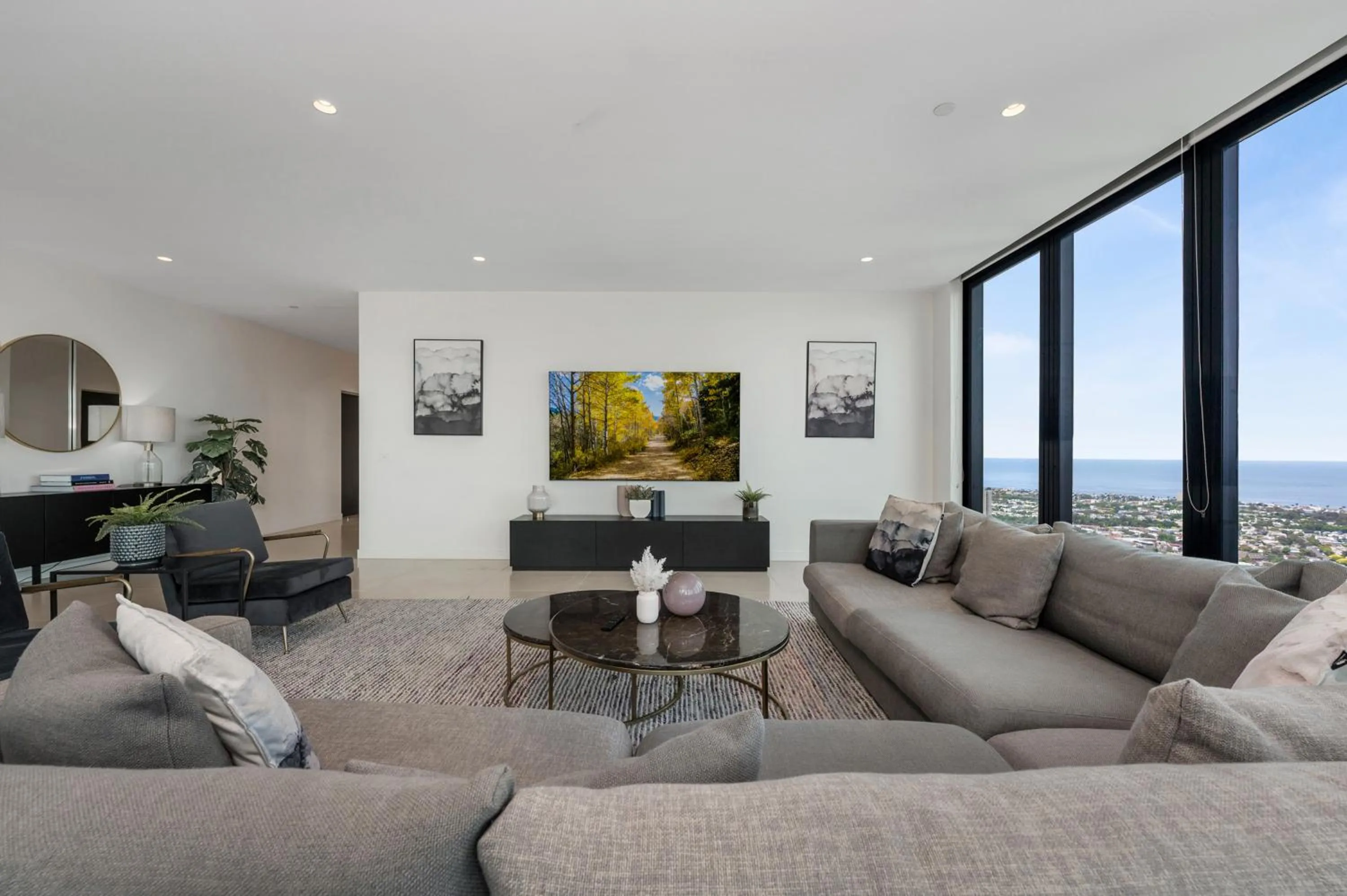 Living room in Melbourne City Apartments Panoramic Skyview Penthouse