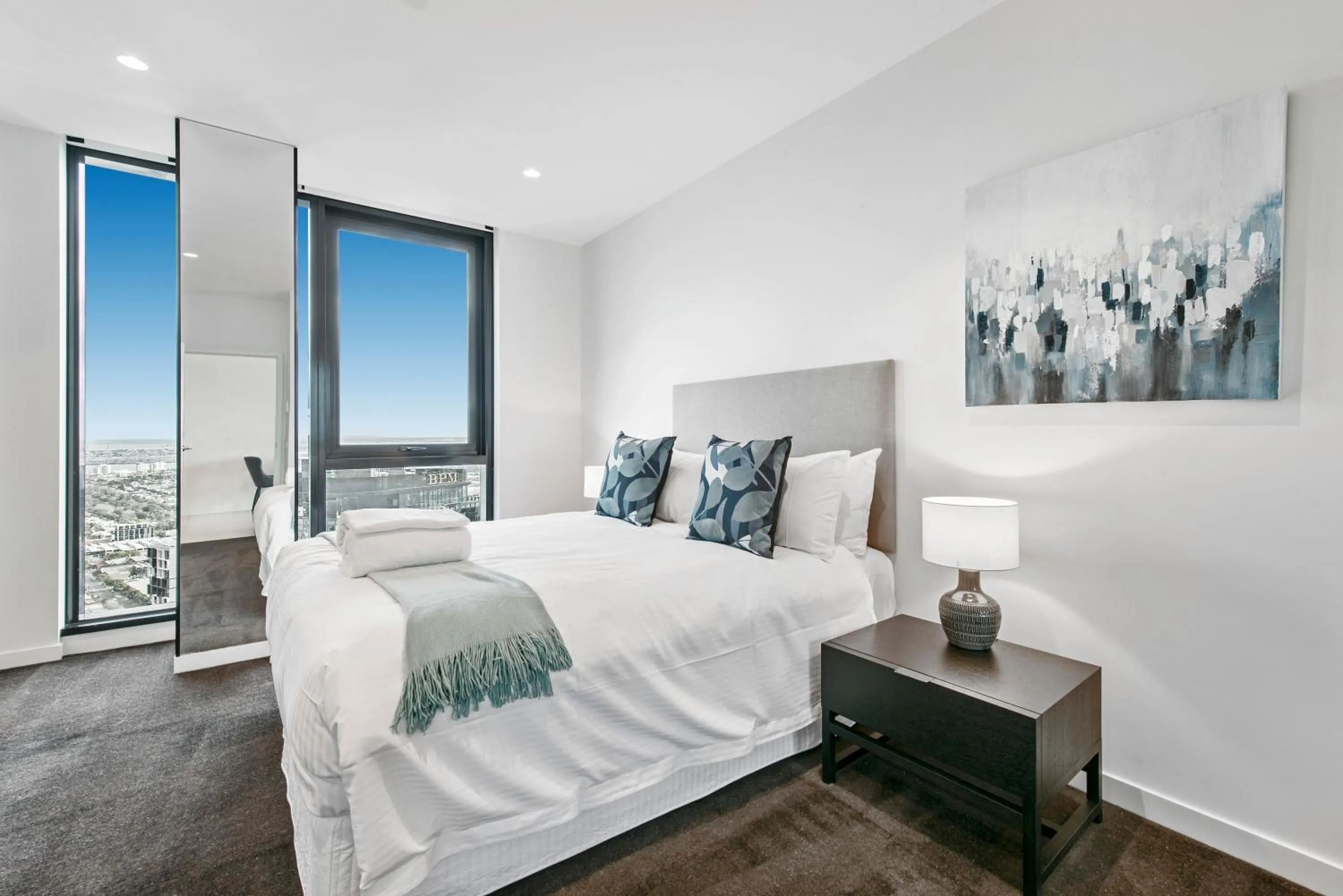 Bedroom, Bed in Melbourne City Apartments Panoramic Skyview Penthouse