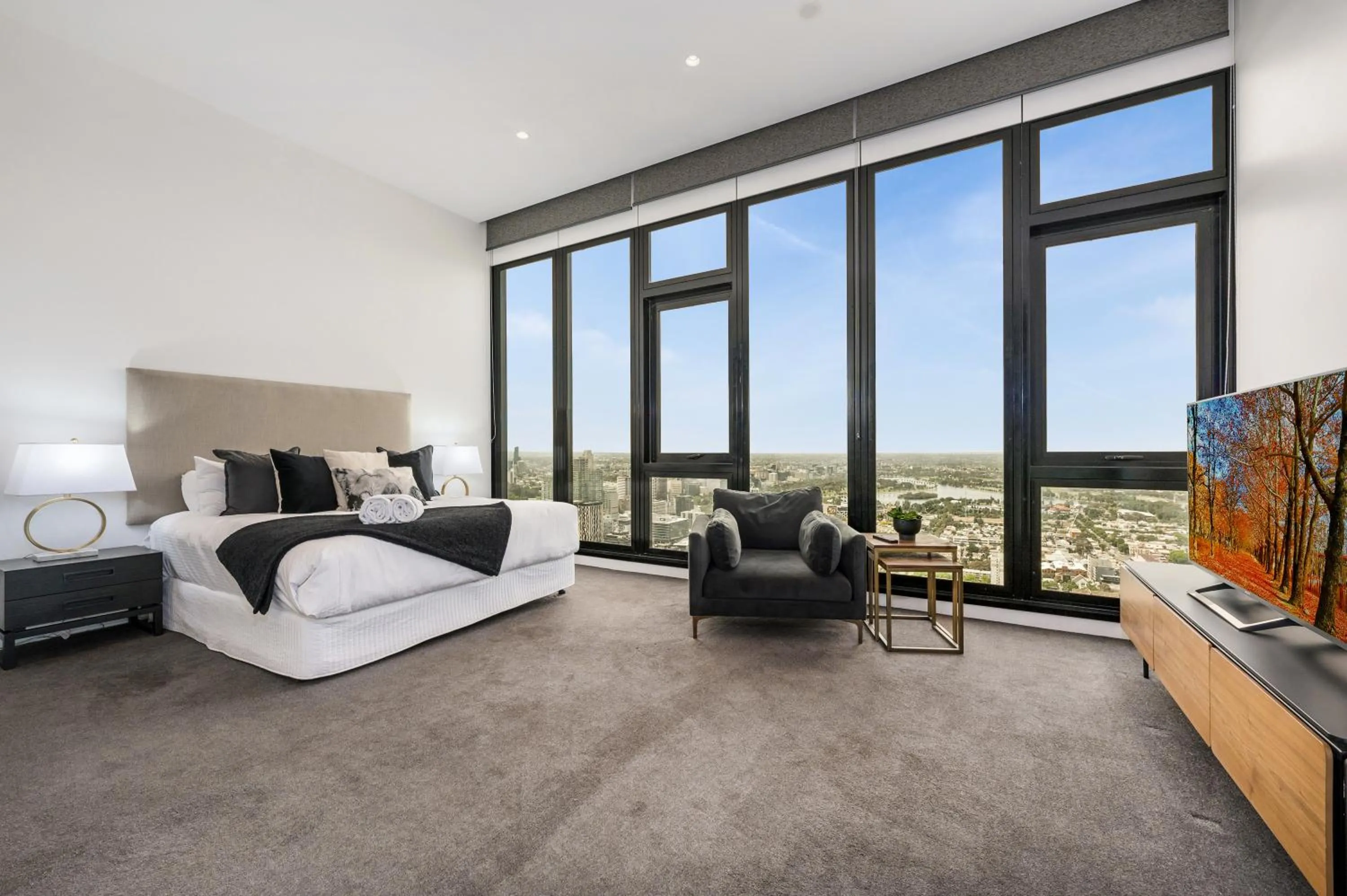 Bedroom, Bed in Melbourne City Apartments Panoramic Skyview Penthouse