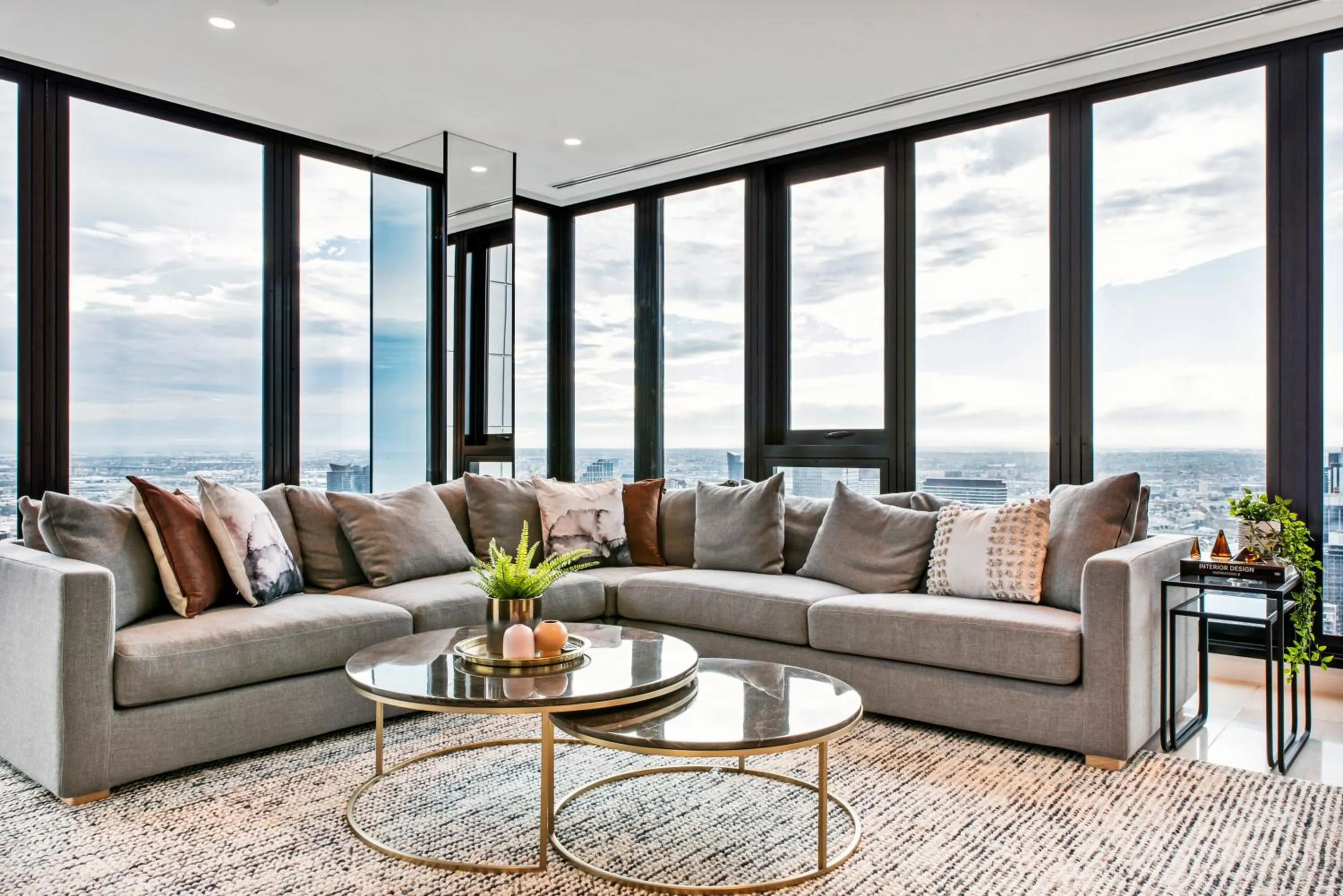 Living room in Melbourne City Apartments Panoramic Skyview Penthouse