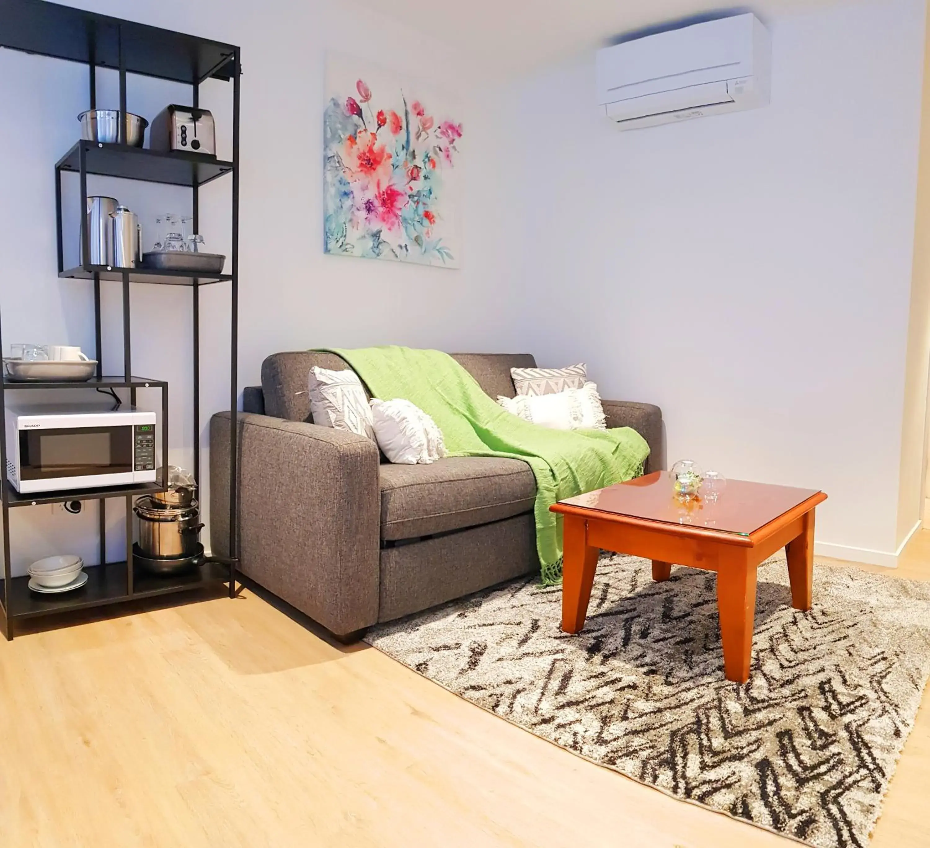 Living room in The Alex Apartments Living room in The Alex Apartments