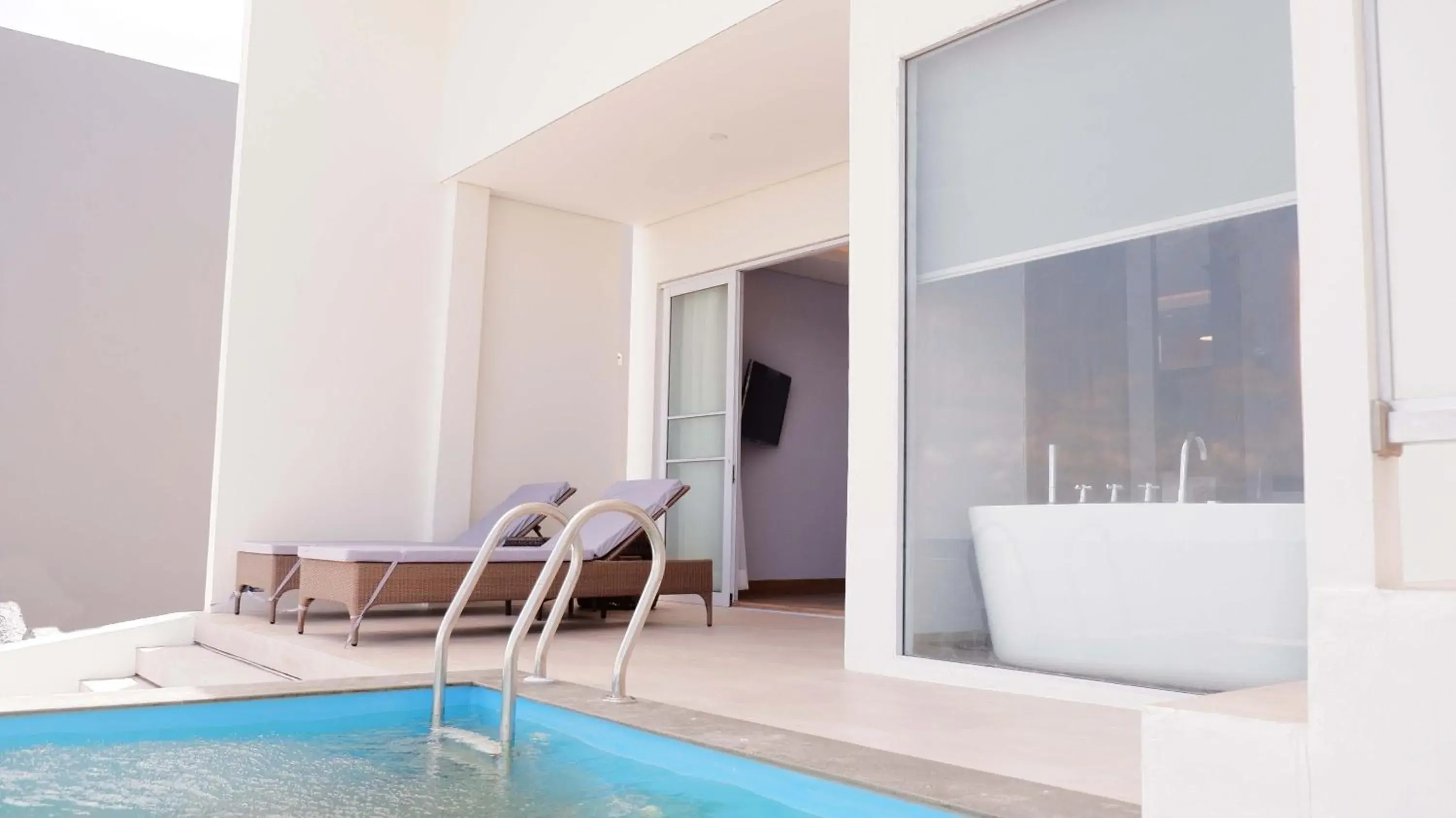 Pool view in One of A Kind Resort @Trikora Beach - Bintan Pool view in One of A Kind Resort @Trikora Beach - Bintan