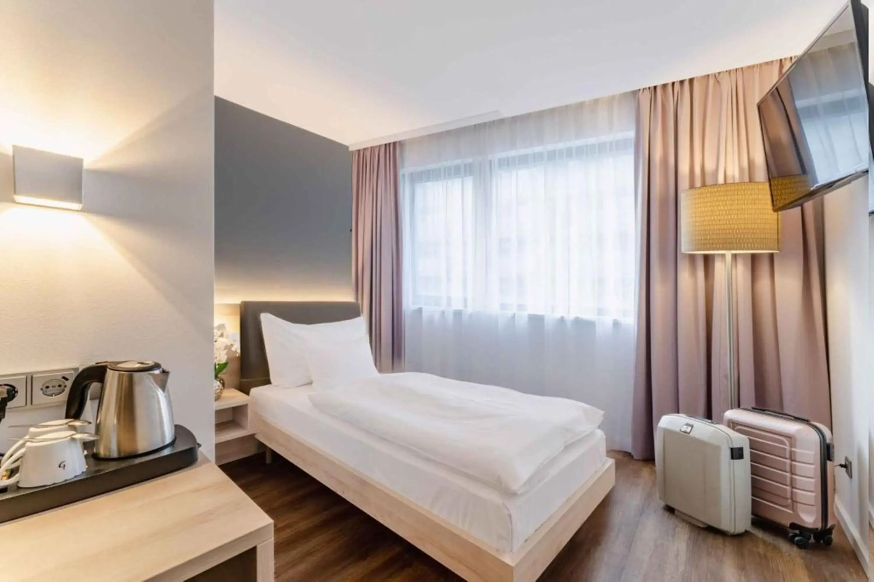 Bed in PLAZA INN Wien Gasometer Bed in PLAZA INN Wien Gasometer