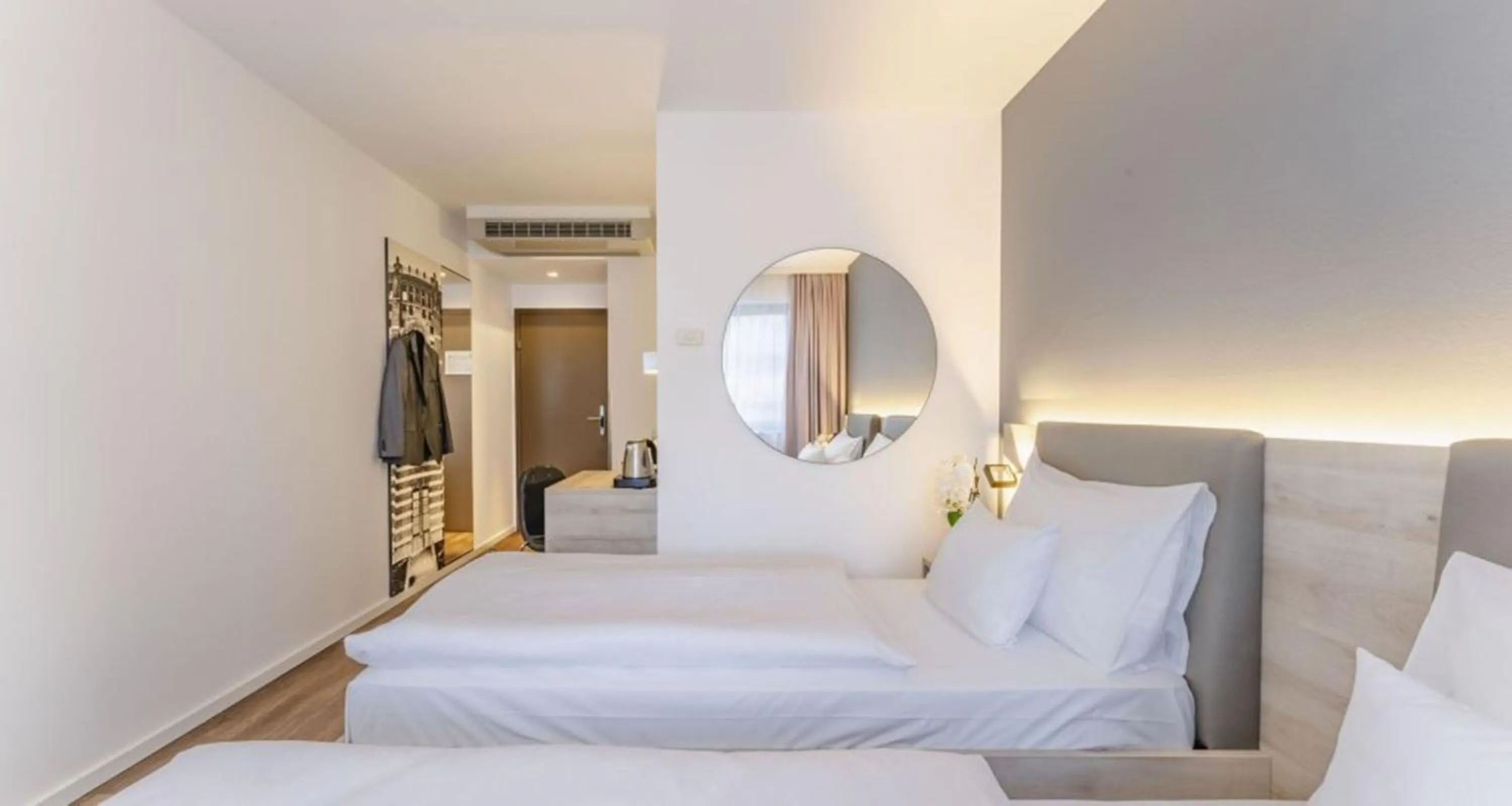 Bed in PLAZA INN Wien Gasometer