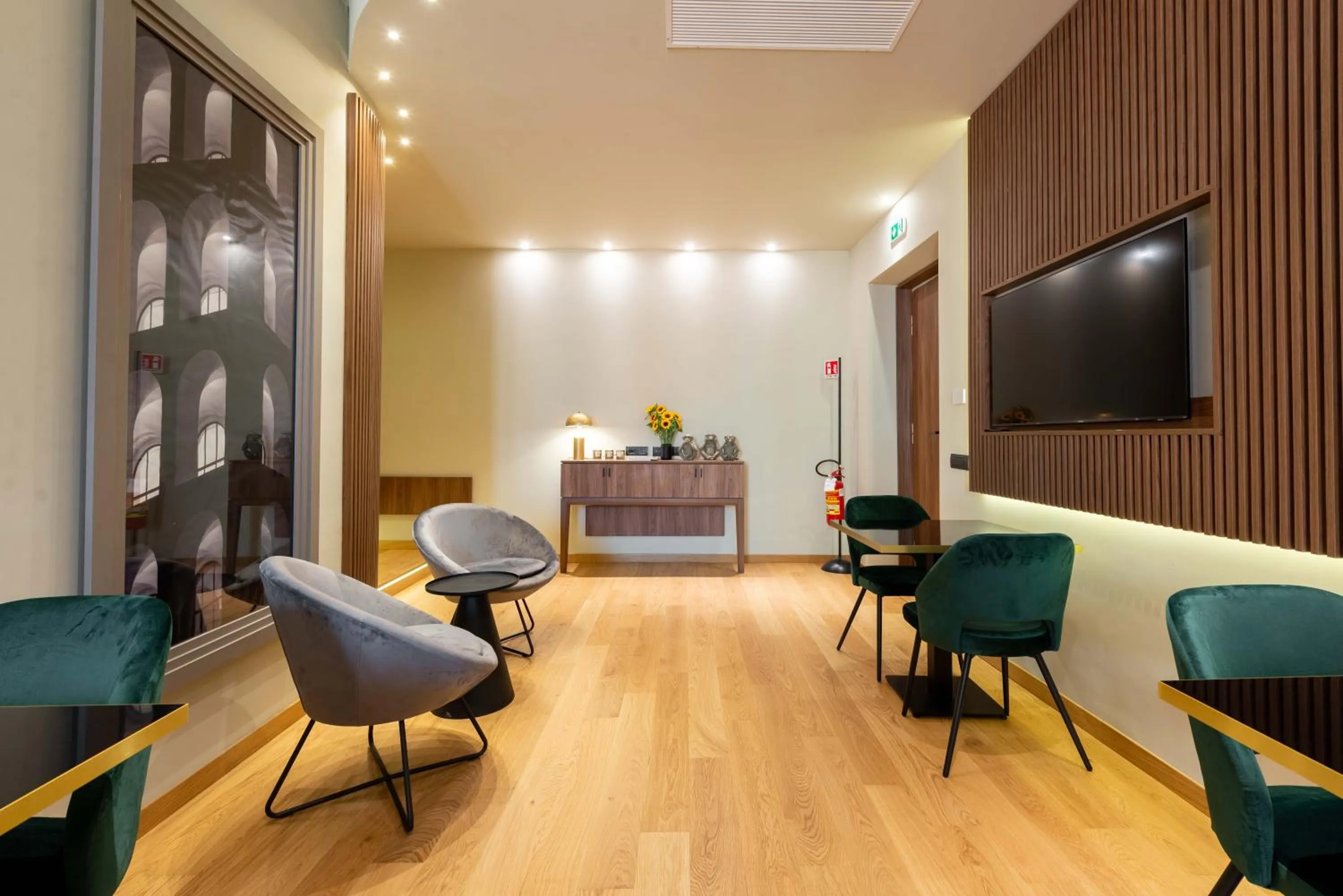 Communal lounge/ TV room in ELICAL Exclusive Private Suites