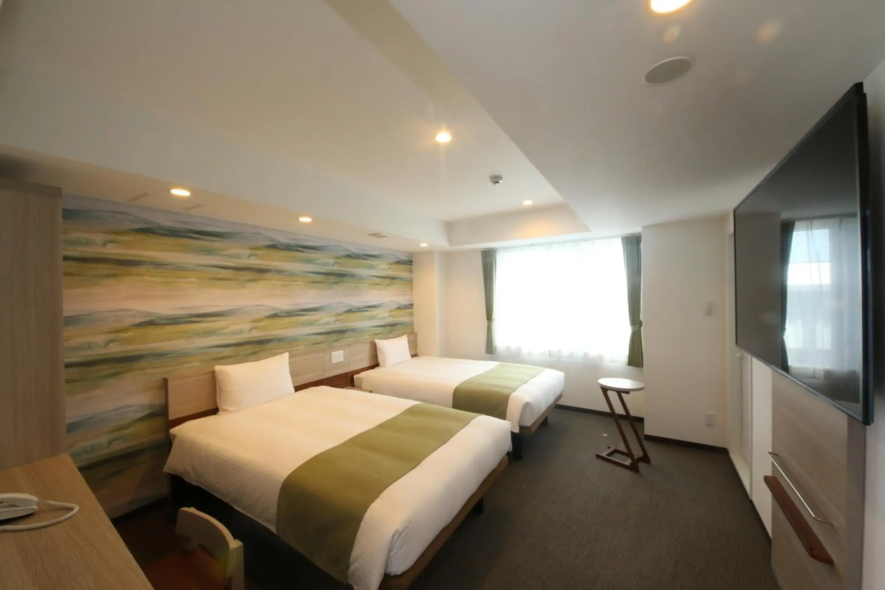 Bed in Kuretake Inn Premium Numazu Kitaguchi Ekimae Bed in Kuretake Inn Premium Numazu Kitaguchi Ekimae