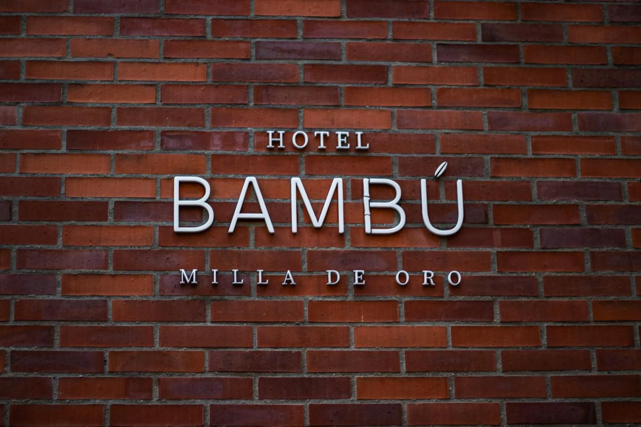 Property logo or sign in Hotel Bambu Milla De Oro
