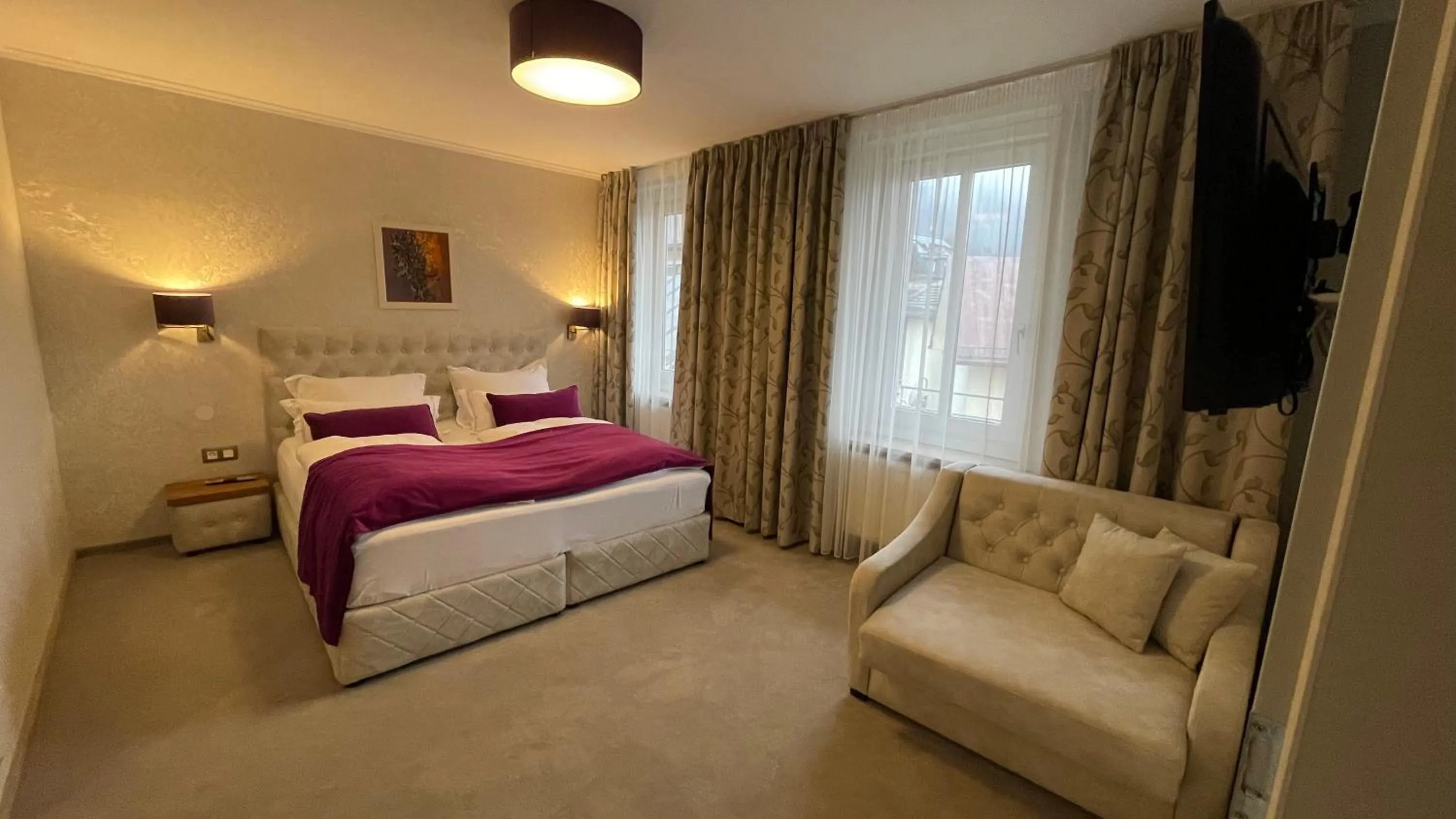 Living room, Bed in Hotel Radetzky