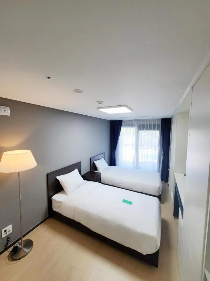 Bed in Risen Ocean Park Hotel