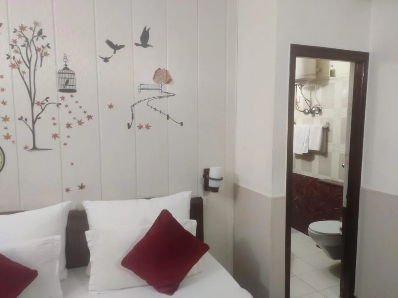 Bed in HOTEL CORPORATE INN