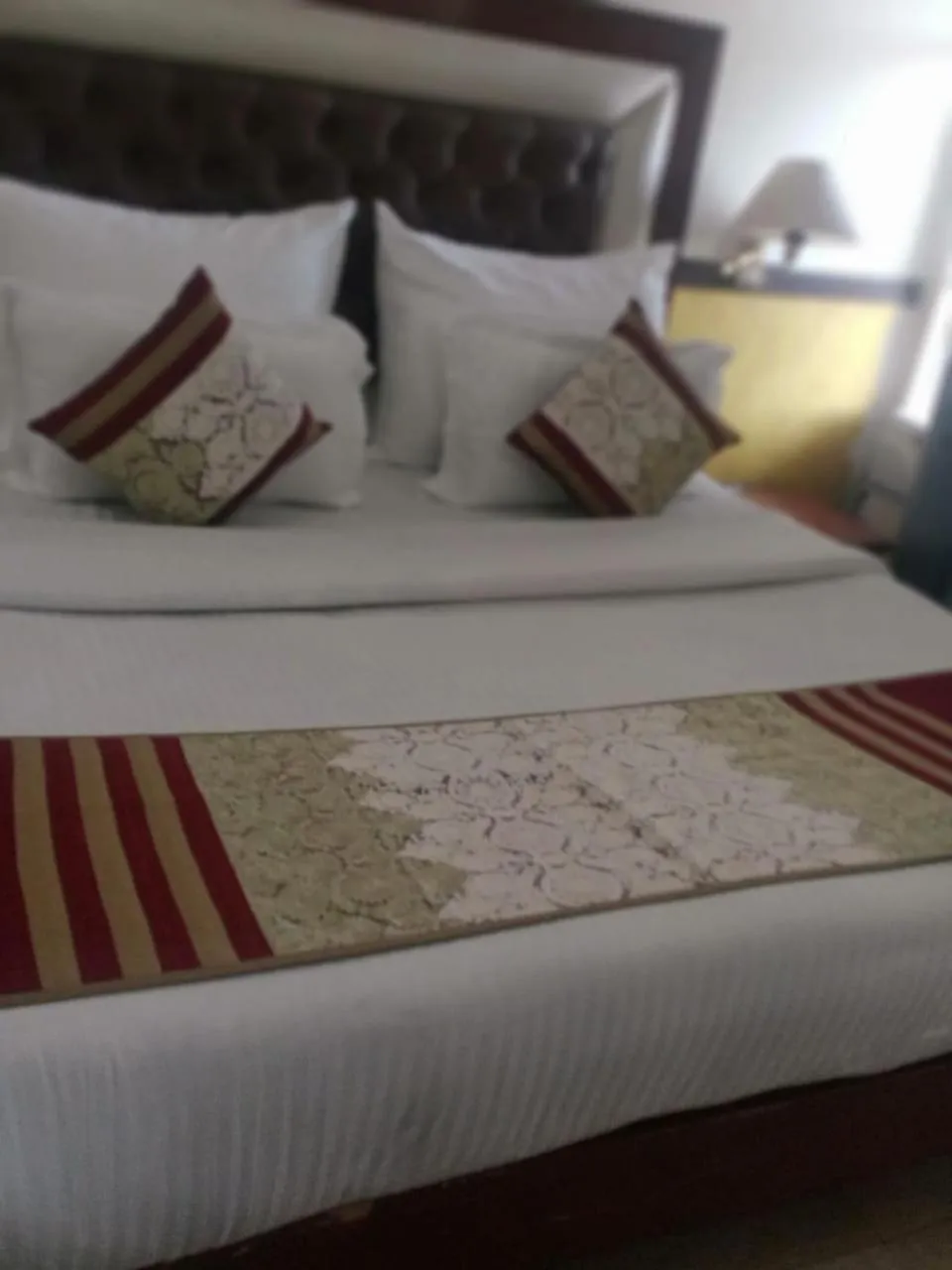 Bed in HOTEL CORPORATE INN