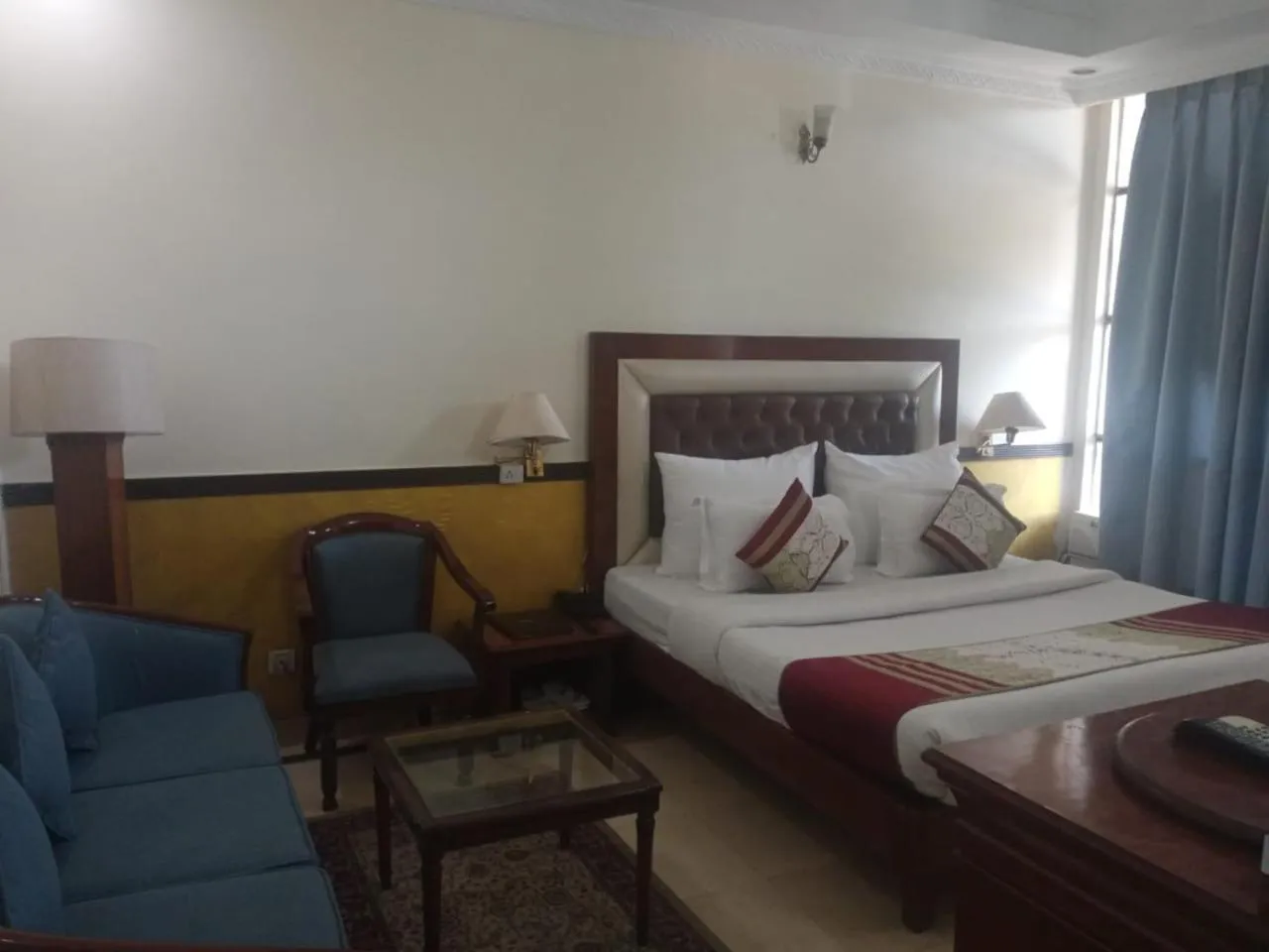 Bed in HOTEL CORPORATE INN