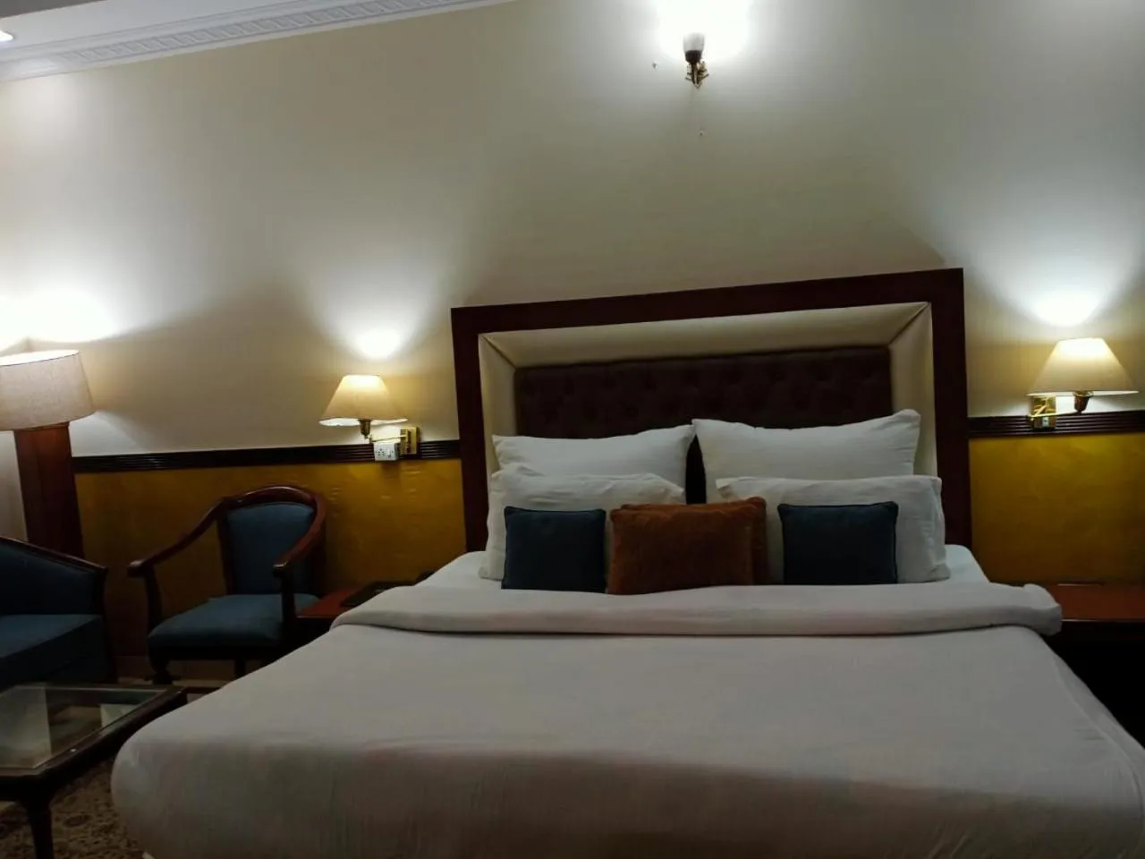 Bed in HOTEL CORPORATE INN