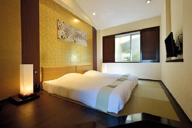 Photo of the whole room, Bed in EXES Ishigaki