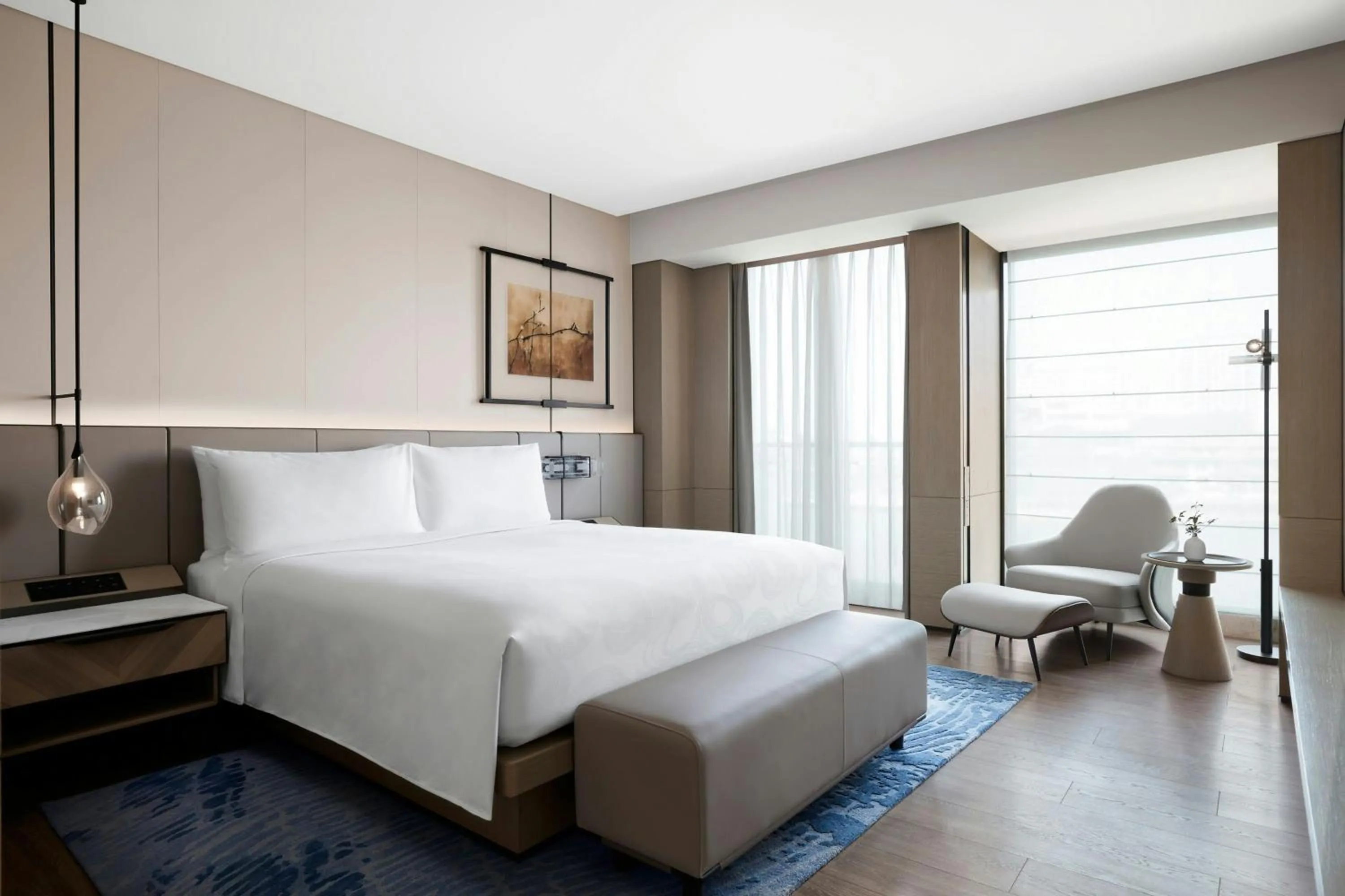 Photo of the whole room, Bed in JW Marriott Shanghai Fengxian