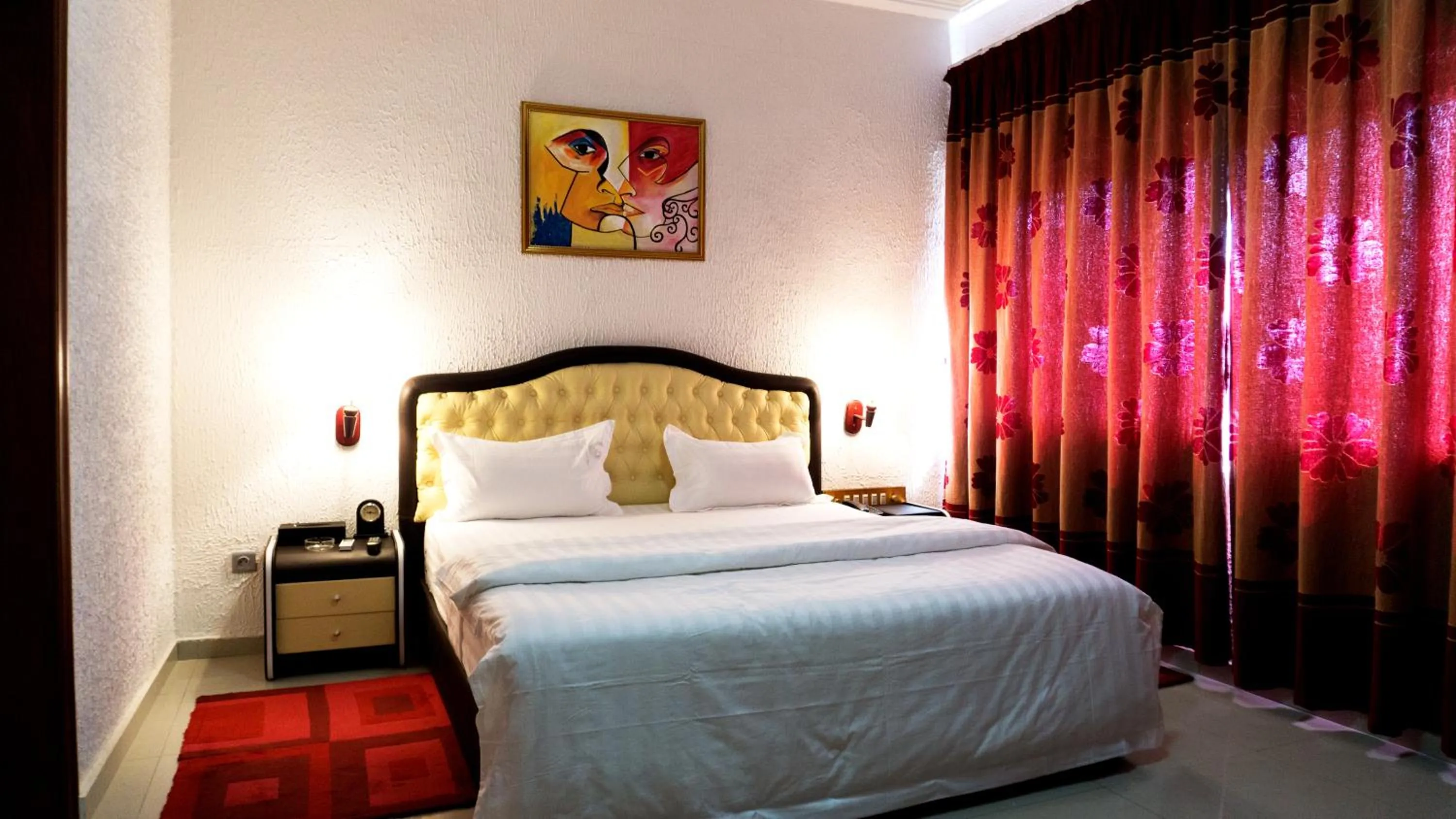 Bed in Millenium Popo Beach Hotel