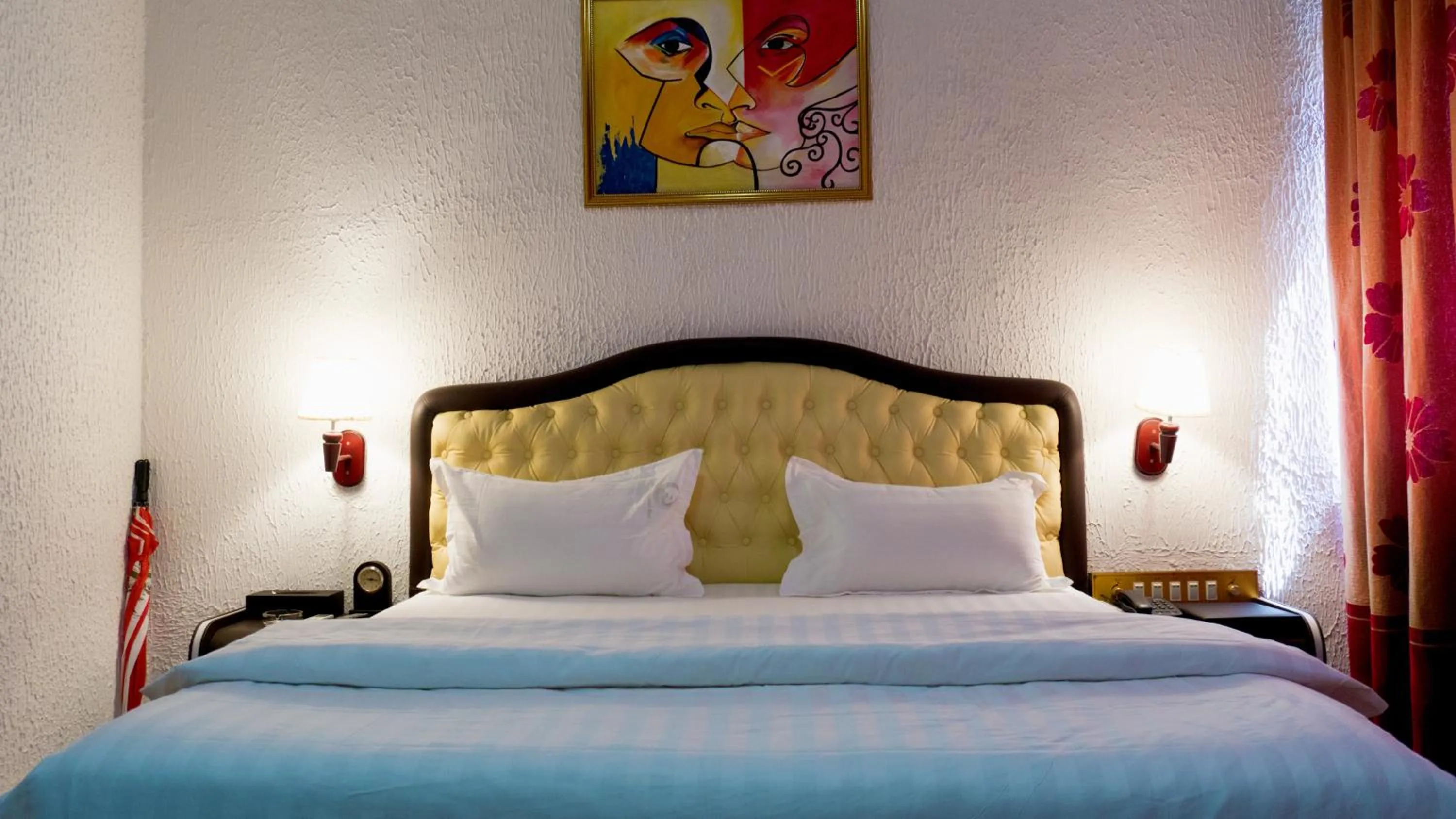 Bed in Millenium Popo Beach Hotel