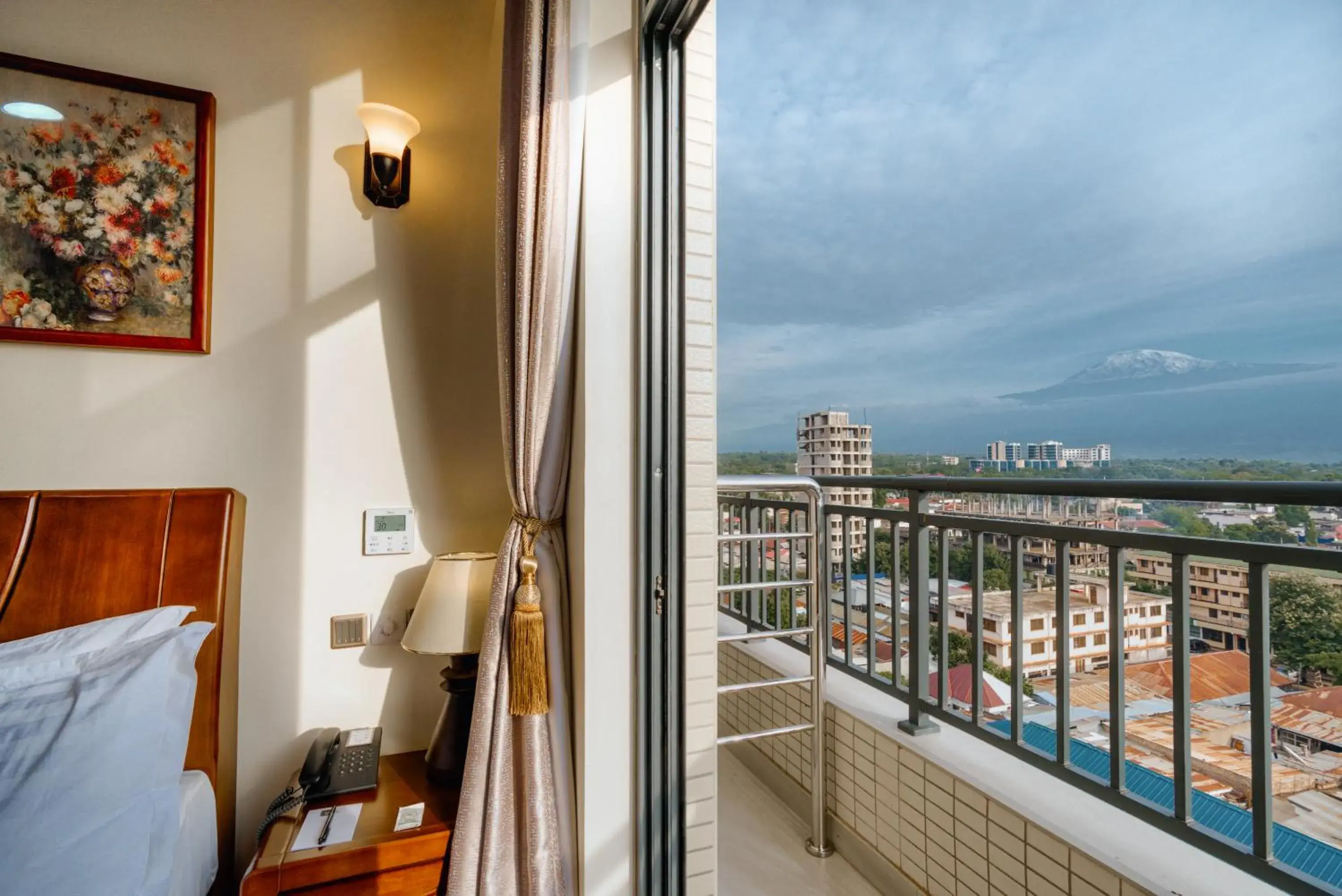 View (from property/room), Bed in Kibo Palace Hotel Moshi View (from property/room), Bed in Kibo Palace Hotel Moshi