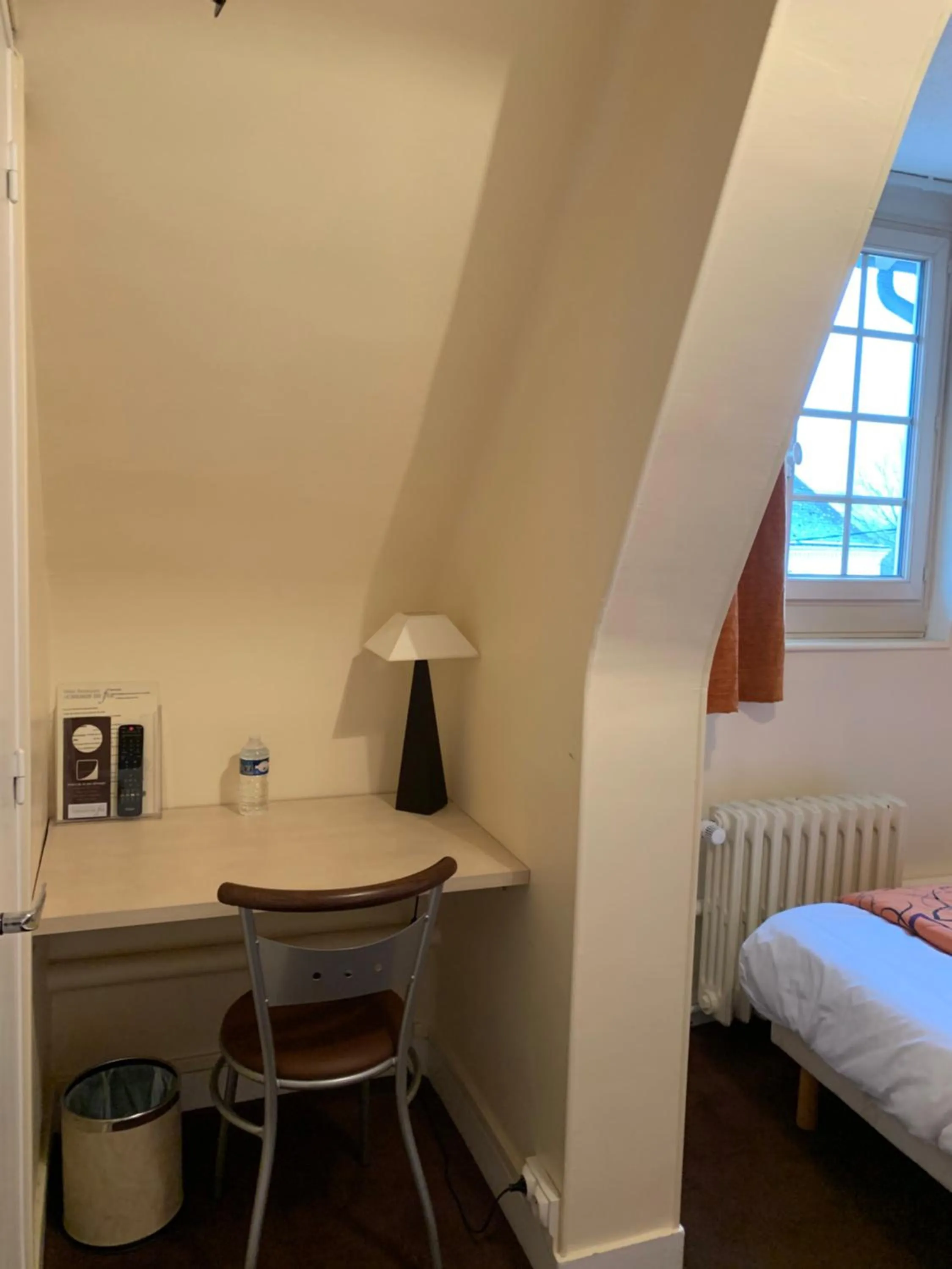 Seating area, Bed in Au Petit Vivoin