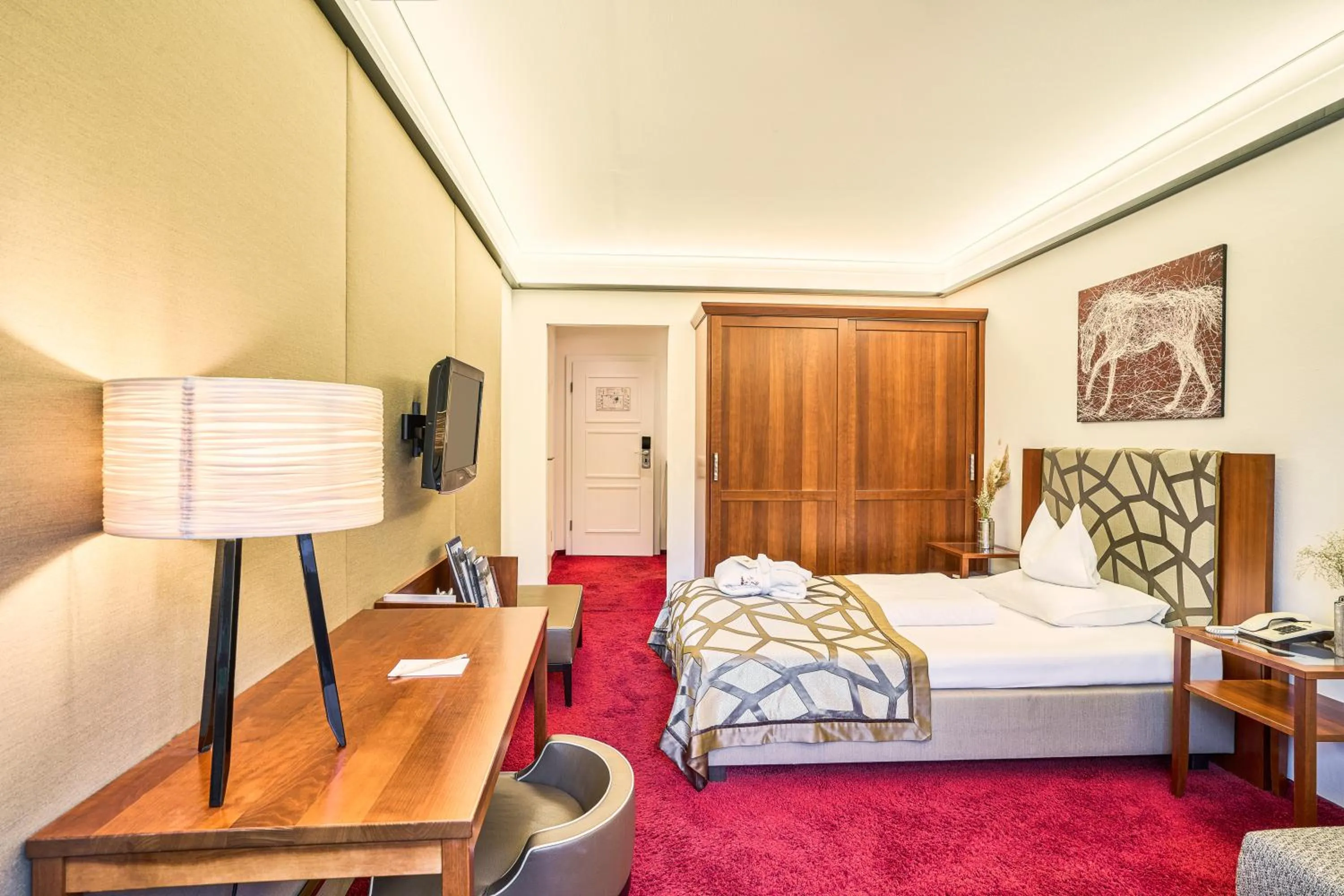 Photo of the whole room, Bed in Romantik Hotel Im Weissen Rössl am Wolfgangsee