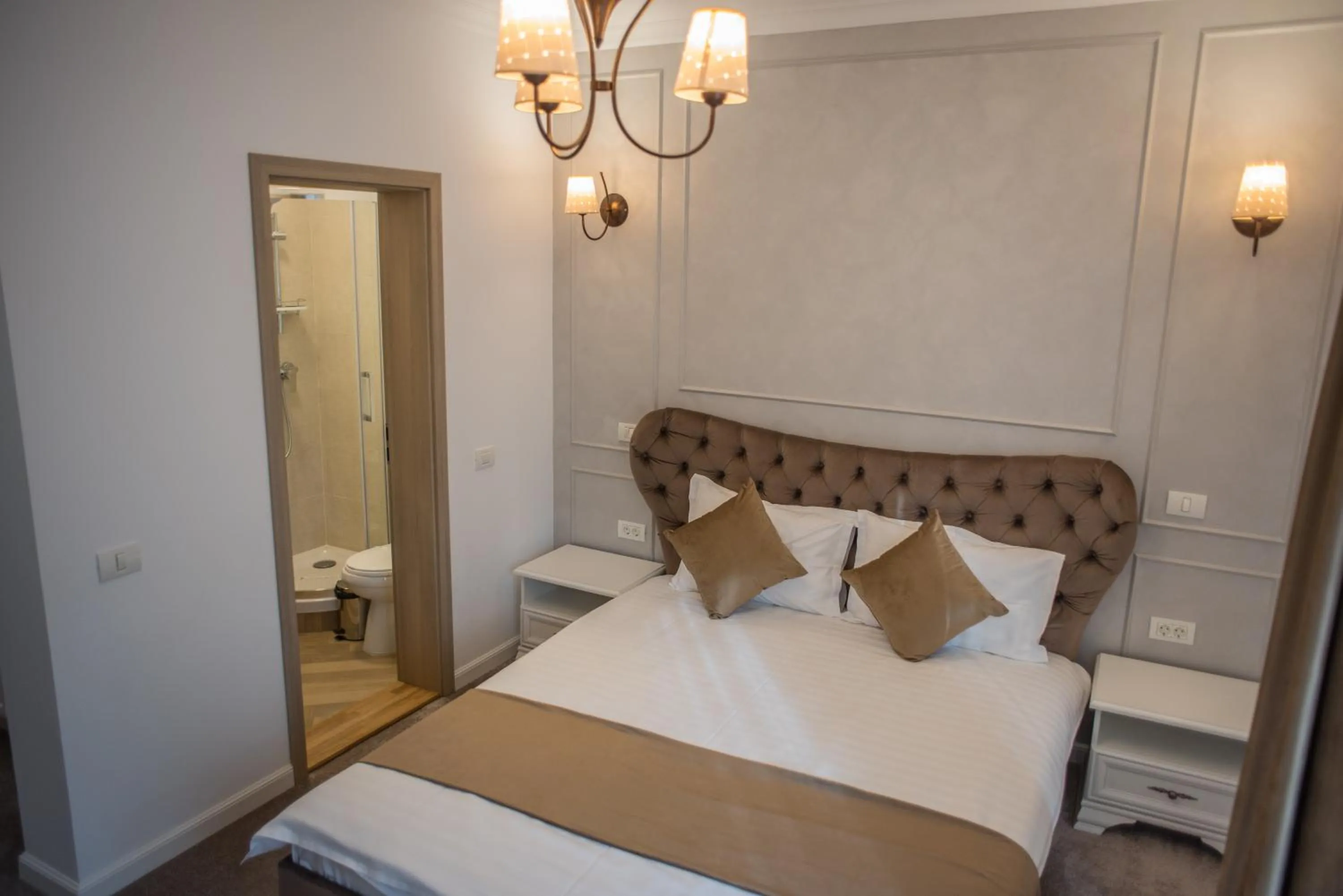 Shower, Bed in Boga Rooms