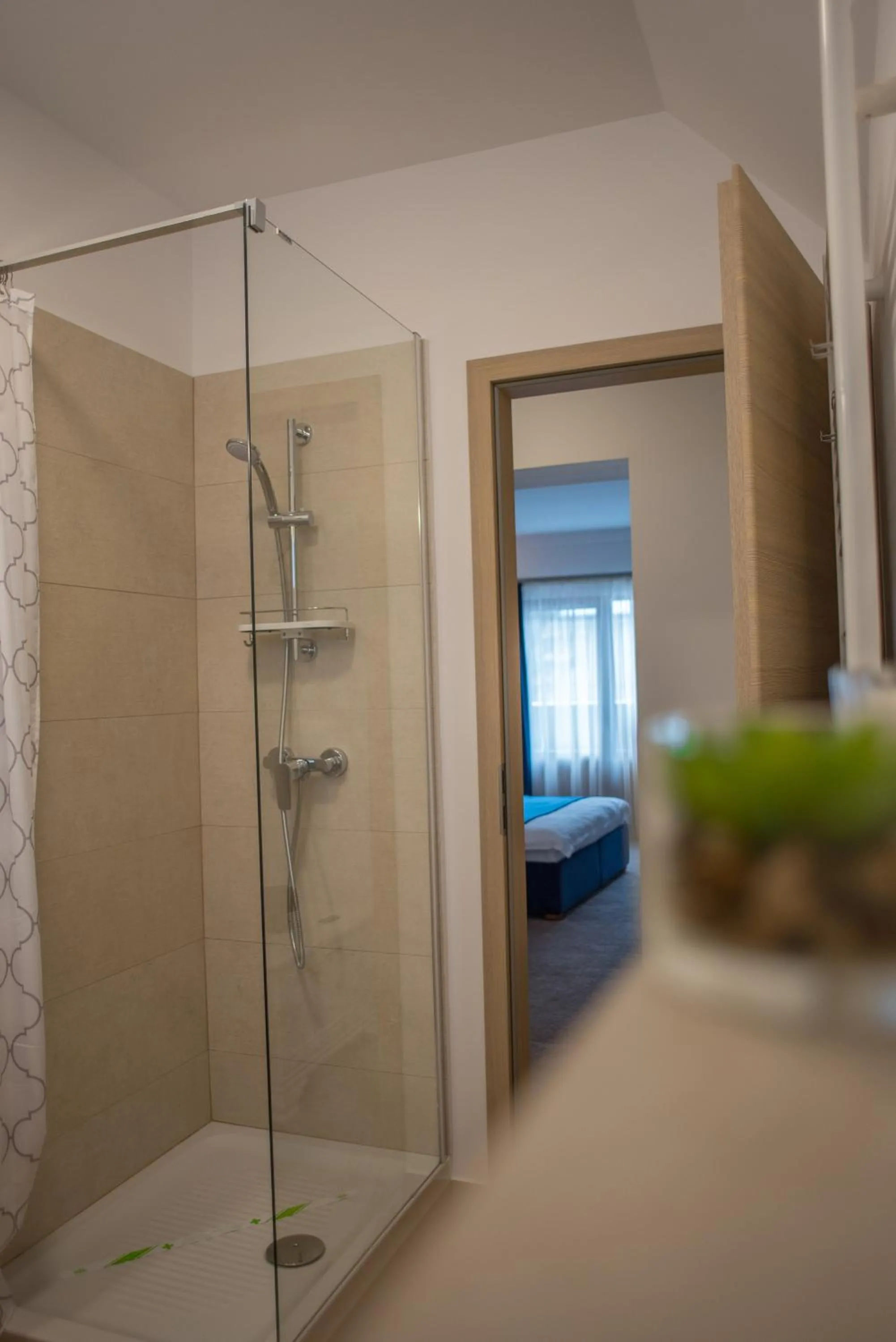 Shower, Bed in Boga Rooms