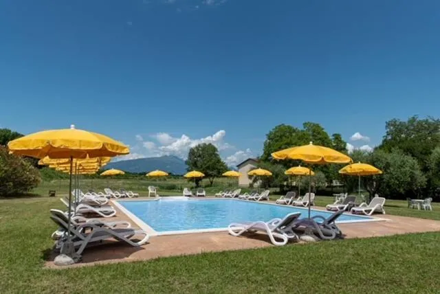 Swimming pool in AGRITURISMO COLOMBARE TEBOI