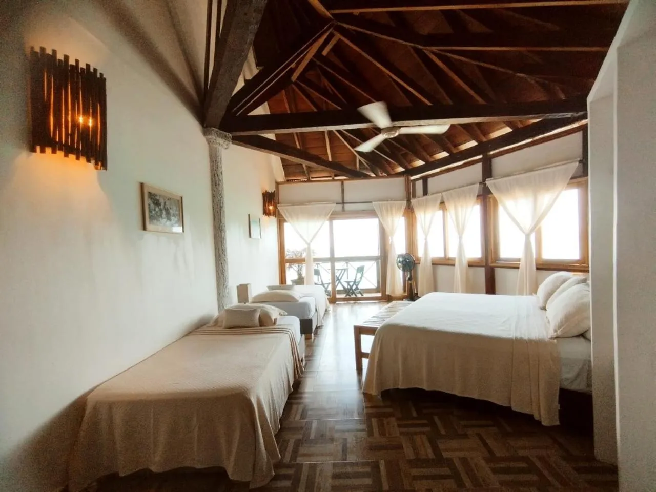 Photo of the whole room, Bed in Rosario EcoHotel - Islas del Rosario