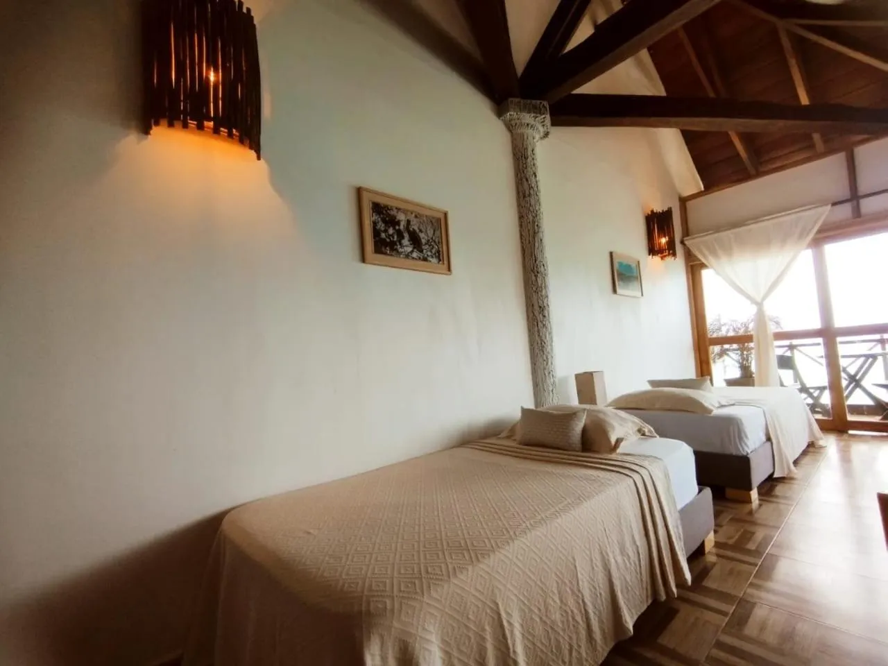 Photo of the whole room, Bed in Rosario EcoHotel - Islas del Rosario