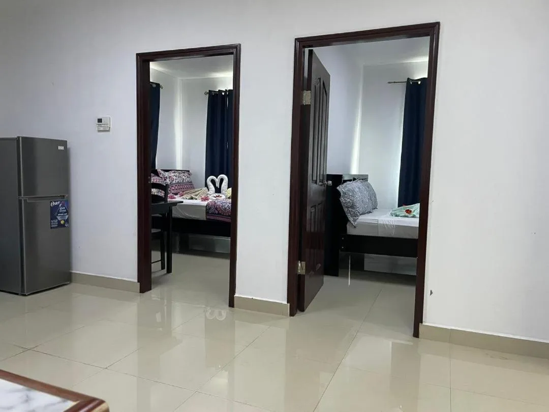 Bed in Hotel Coastalbay 2 & Golf Cart Rental