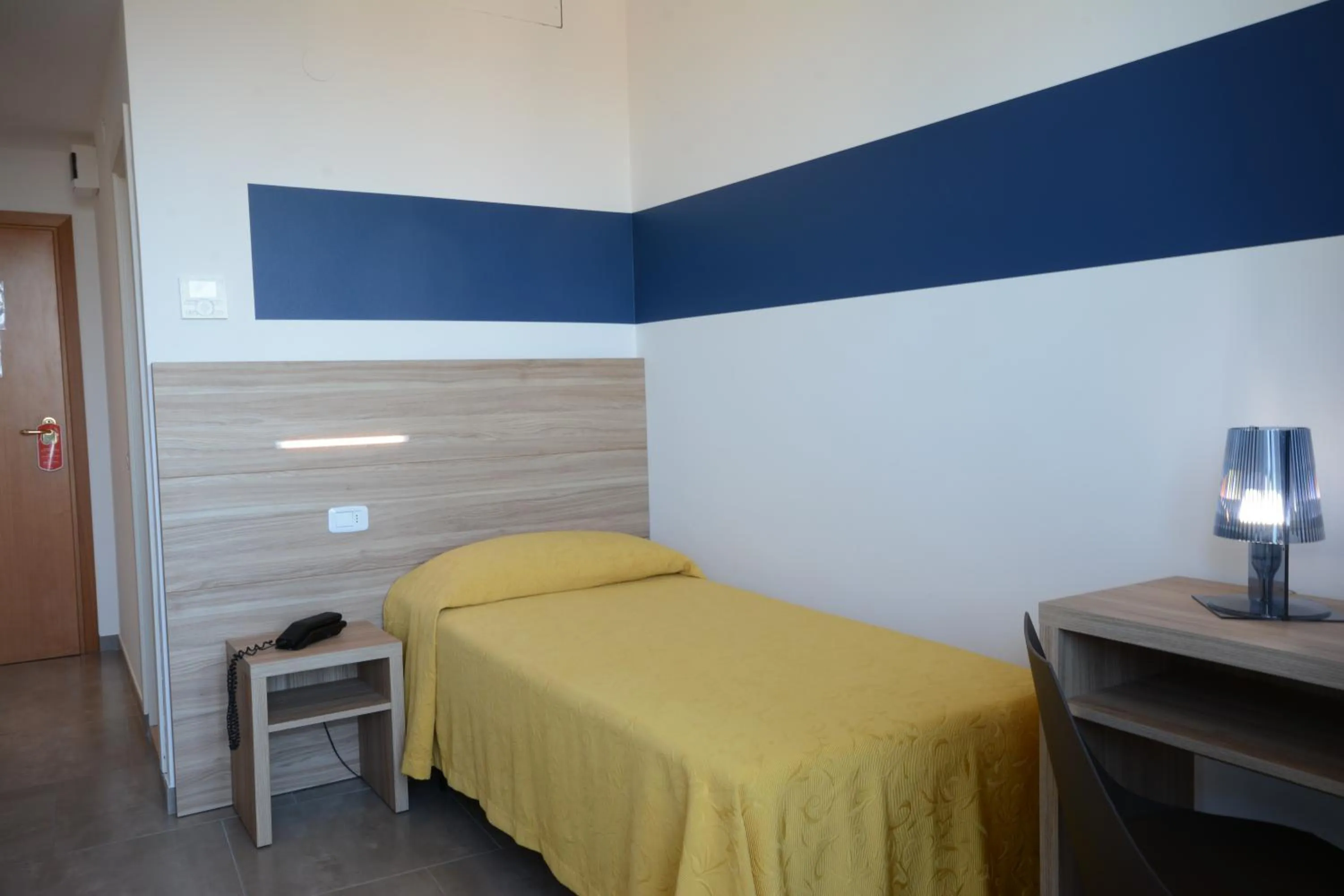 Bed in Hotel Caravelle