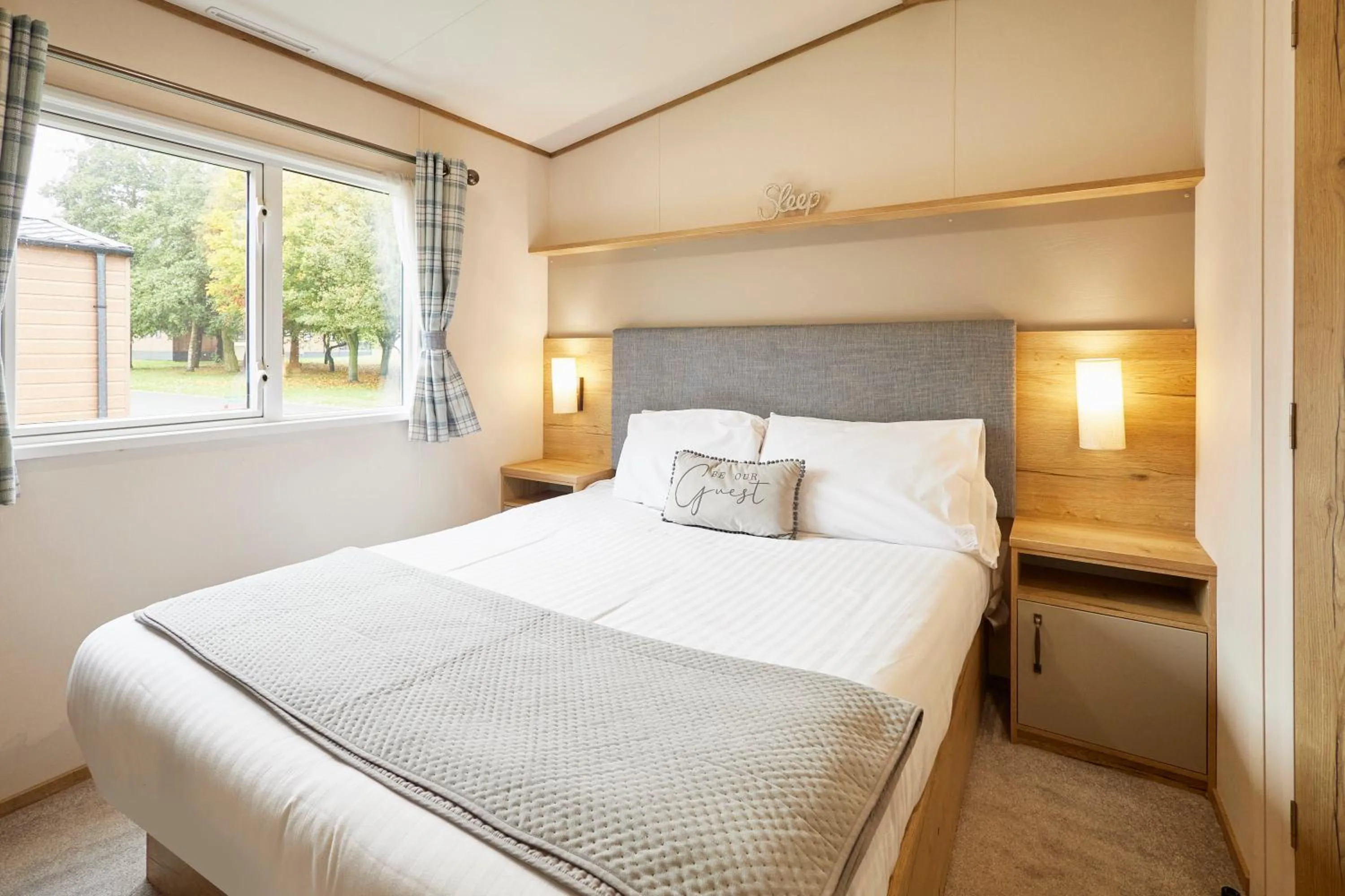 Bed in Squirrel Lodge with Hot Tub